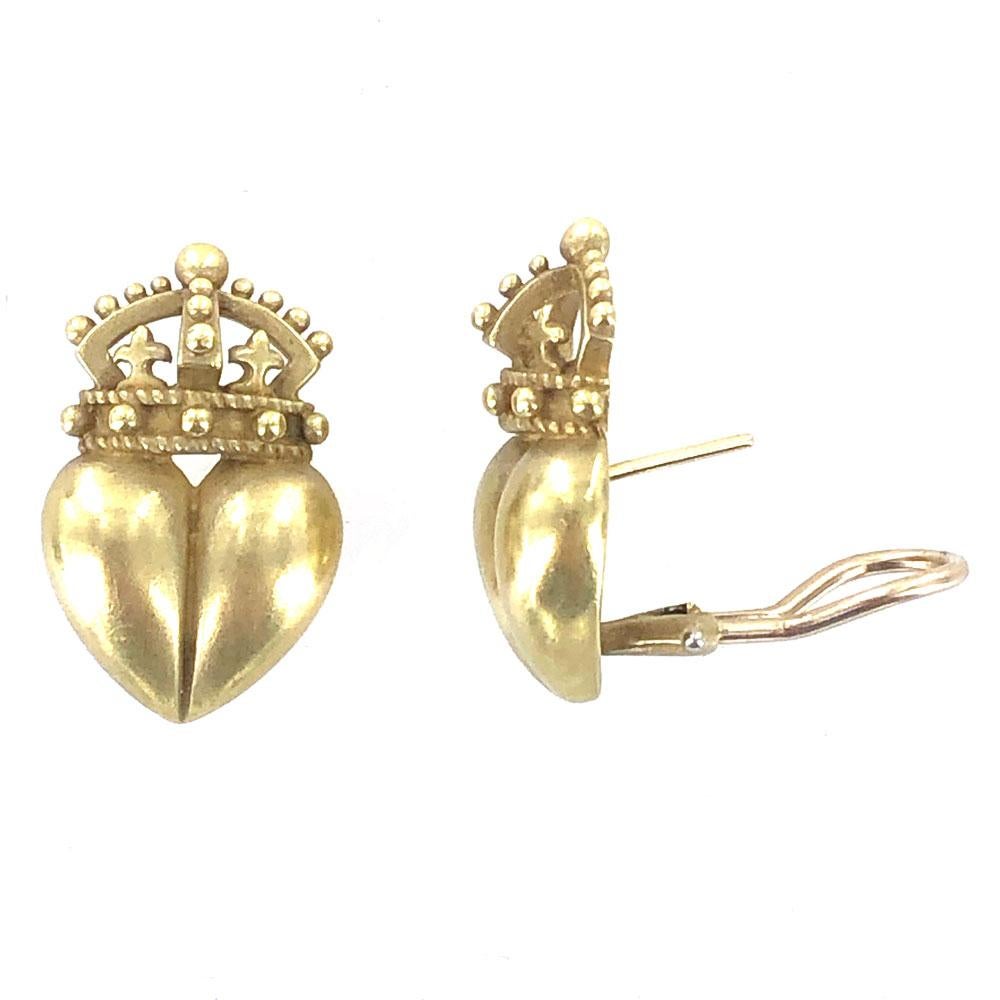 Kieselstein-Cord Heart and Crown Earrings are crafted in 18 karat yellow gold. The satin finished gold is Kieselstein's hallmark. The earrings measure 15 x 25mm, and feature lever backs. Signed Kieselstein Cord 18k c 1987.