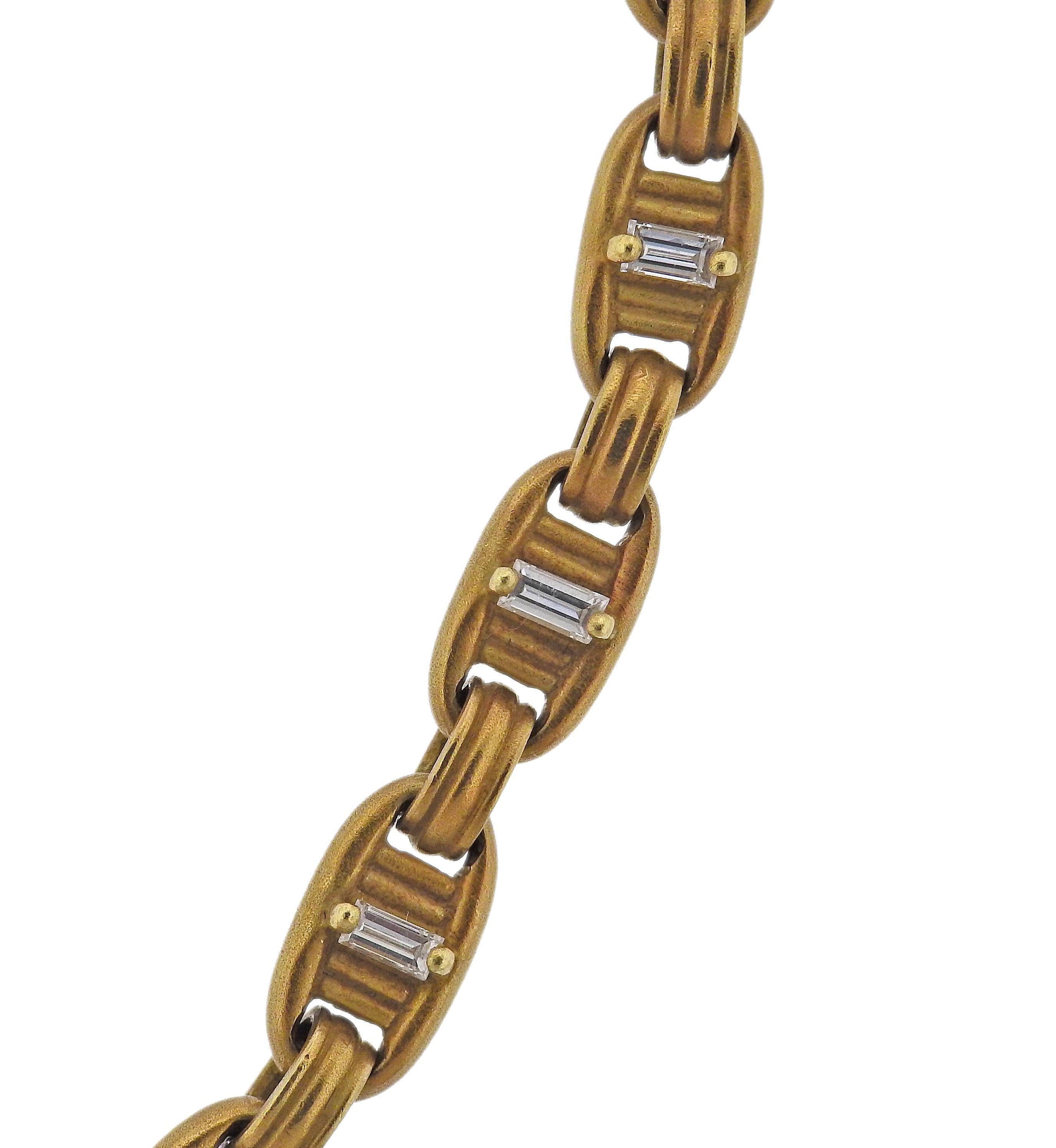 18k gold link necklace by Barry Kieselstein-Cord, set with approx. 0.52ctw in baguette cut diamonds. Center has a hidden bale to attach a pendant. Necklace is 16.5