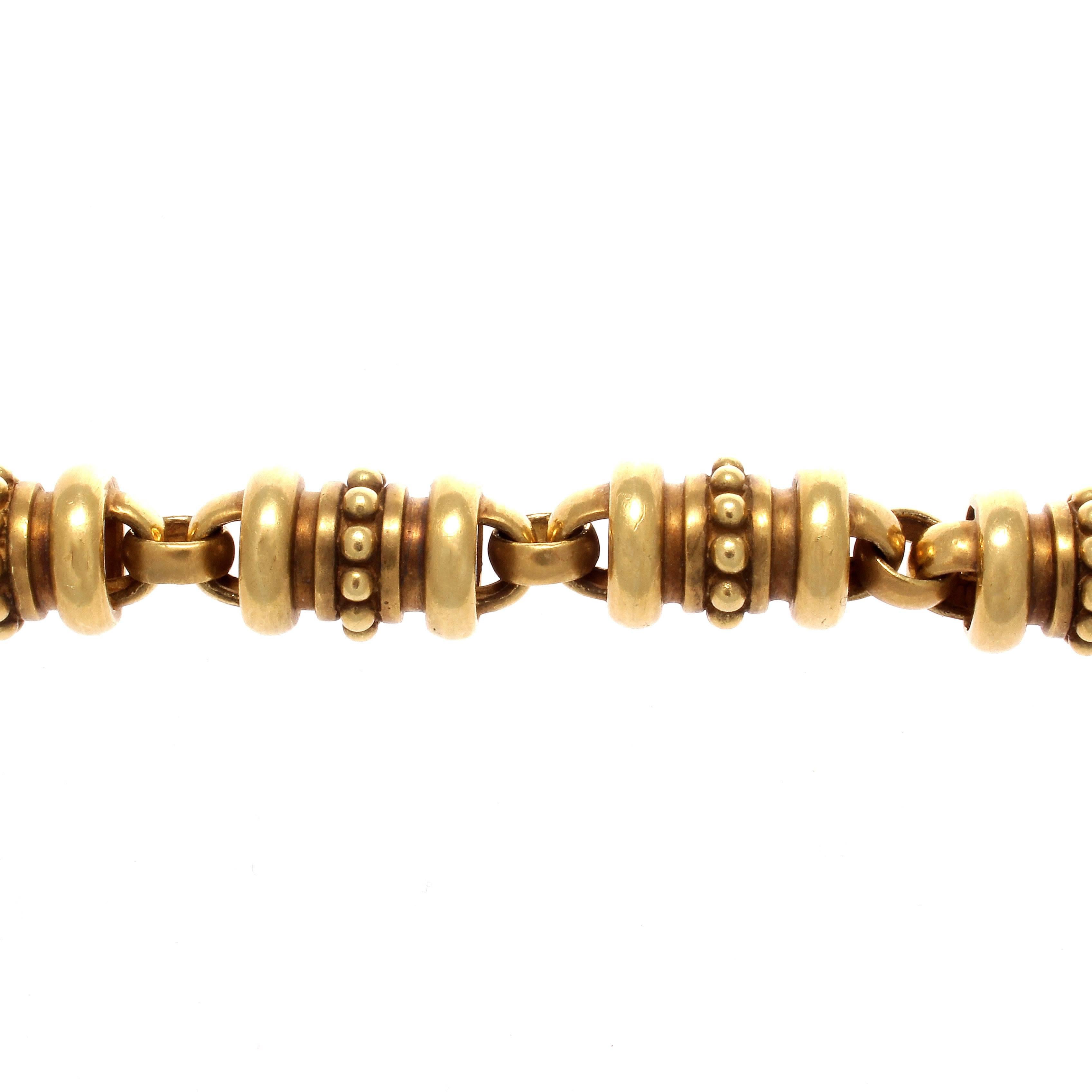 Kieselstein's artistic vision and his unique and singular designs create his recognizable line of jewelry. The symmetrical bracelet is made with finely detailed 18k yellow gold. Signed Kieselstein-Cord. Weighs 69.7 gram. 7-1/2 inches long