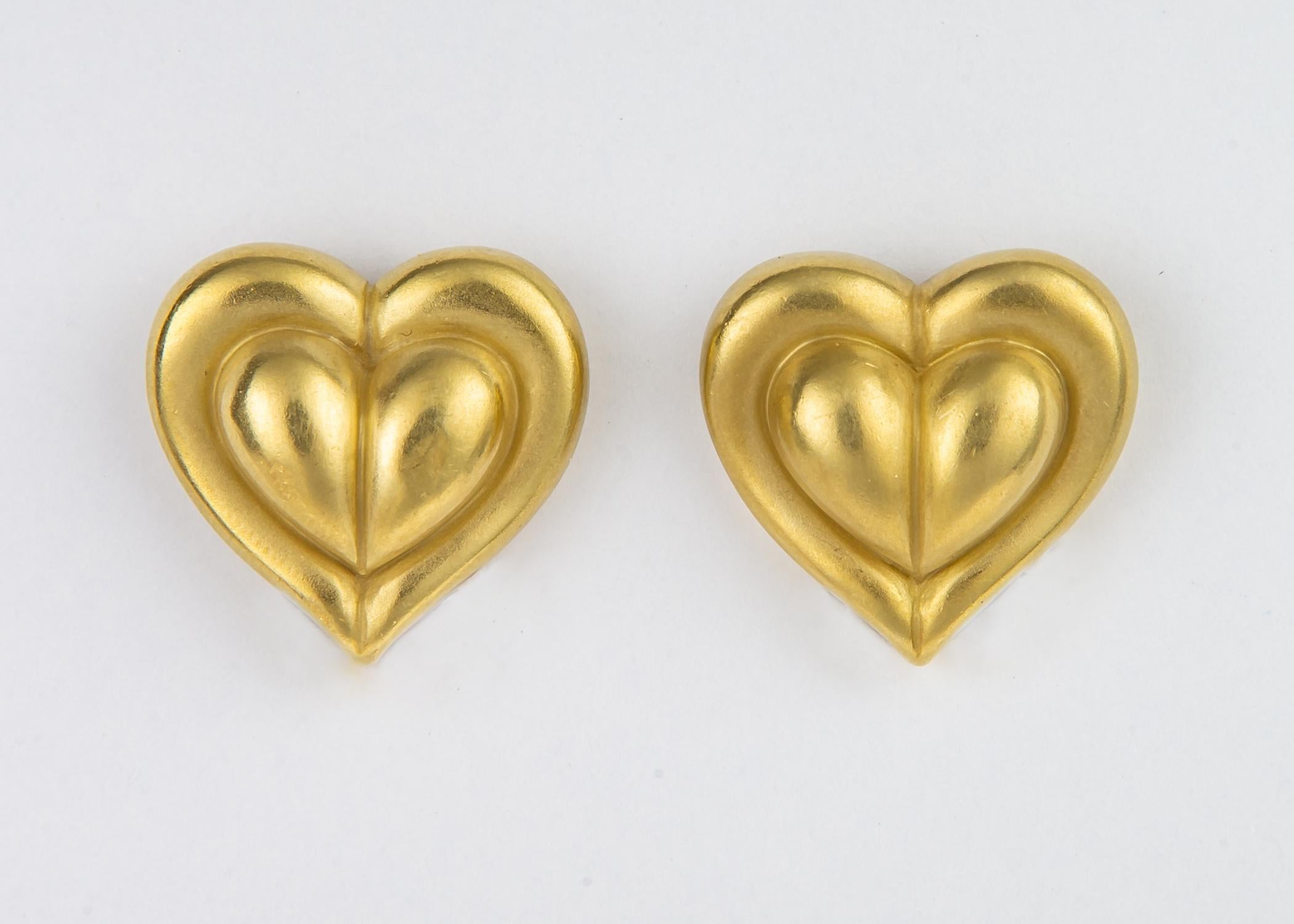 Barry Kieselstein-Cord designs have withstood the test of time. This simple heart motif design can be your new all the time earring.  7/8's of an inch 