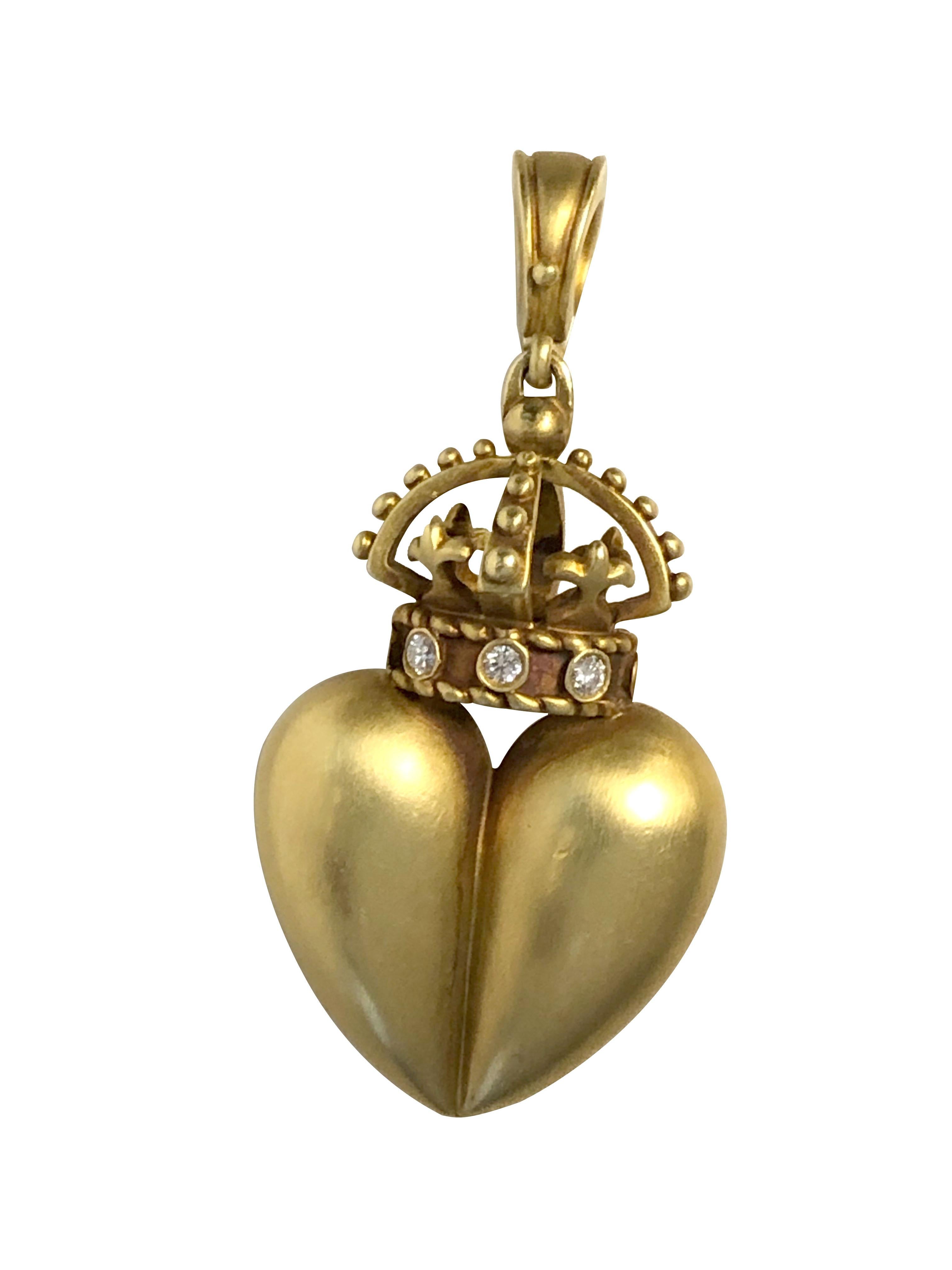Circa 1990 Barry Kieselstein Cord Crowned Heart Pendant, measuring 2 inches in length X 1 inch wide and 5/8 inch wide. Very well detailed with a frosted / brushed finish and set with 8 Round Brilliant cut Diamonds totaling .40 Carat, weighing 28