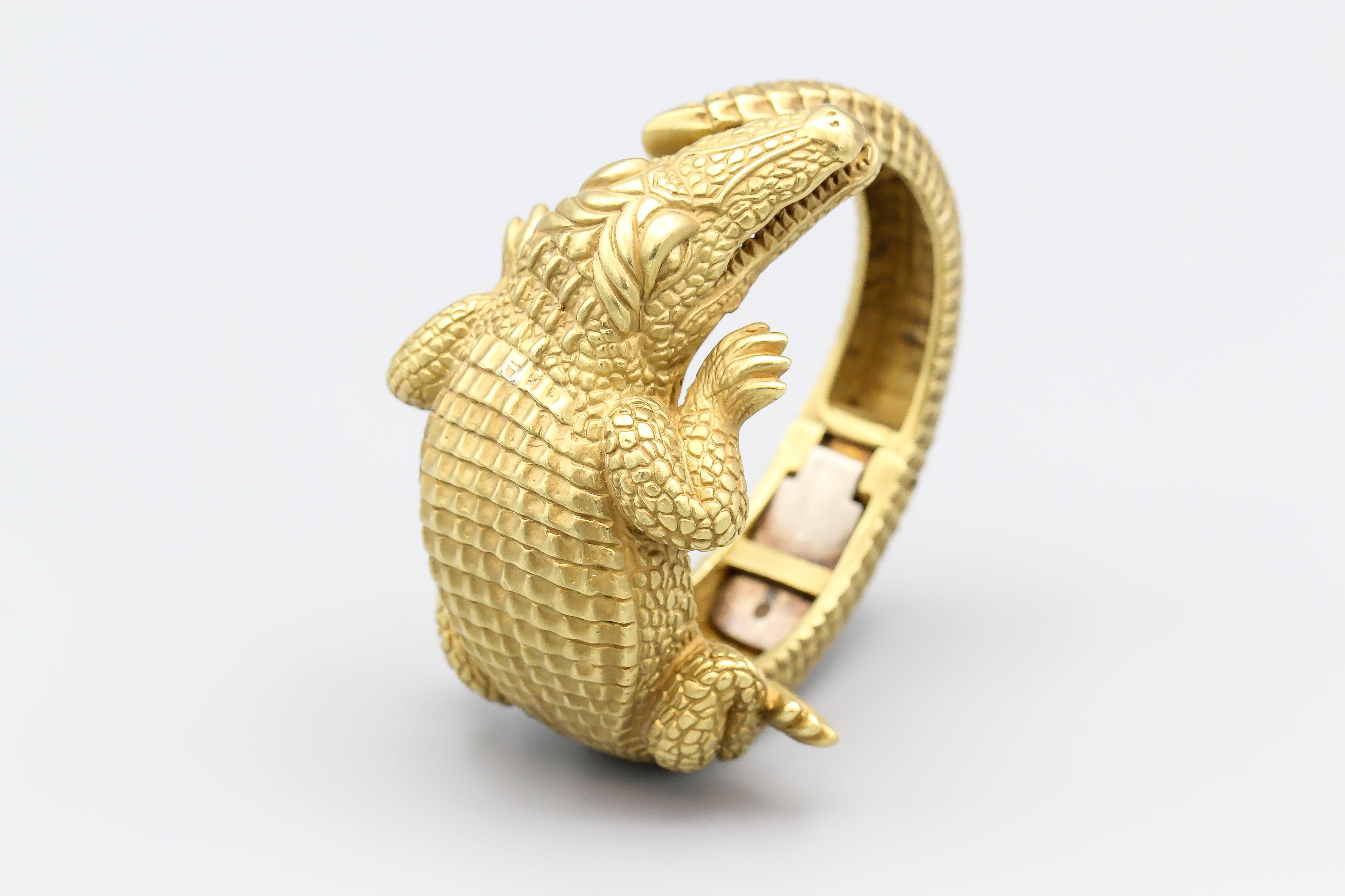 Fine 18K gold alligator cuff bracelet by Kieselstein-Cord, circa 1980s. At approx. 187 grams, we believe this to be the largest size made available of this model bracelet.  It will comfortably fit a 6