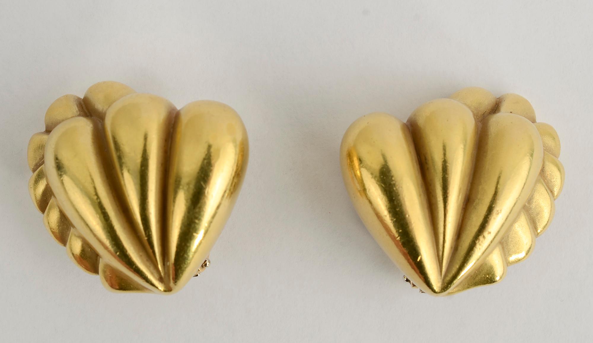 Large 18 karat gold earrings by Barry Kieselstein Cord that are abstracted, lobed hearts.
Backs are clips that can be converted to posts.