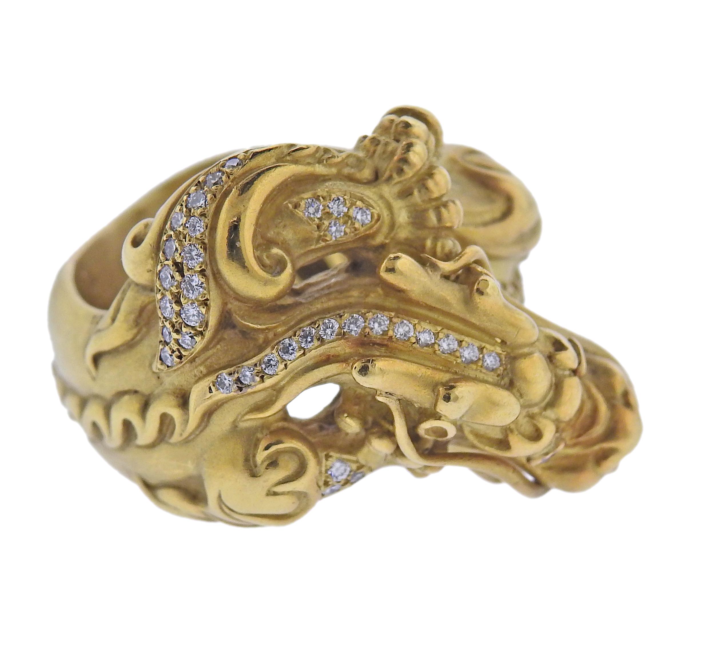 Rare 18k gold dragon ring by Barry Kieselstein-Cord, with ruby eyes and approx. 0.30ctw G/VS diamonds. Ring size 9, top of the ring is 25mm wide.  Weight - 34.4 grams. Marked: B. Kieselstein-Cord, 1998, 18k, 750, Maker's mark.