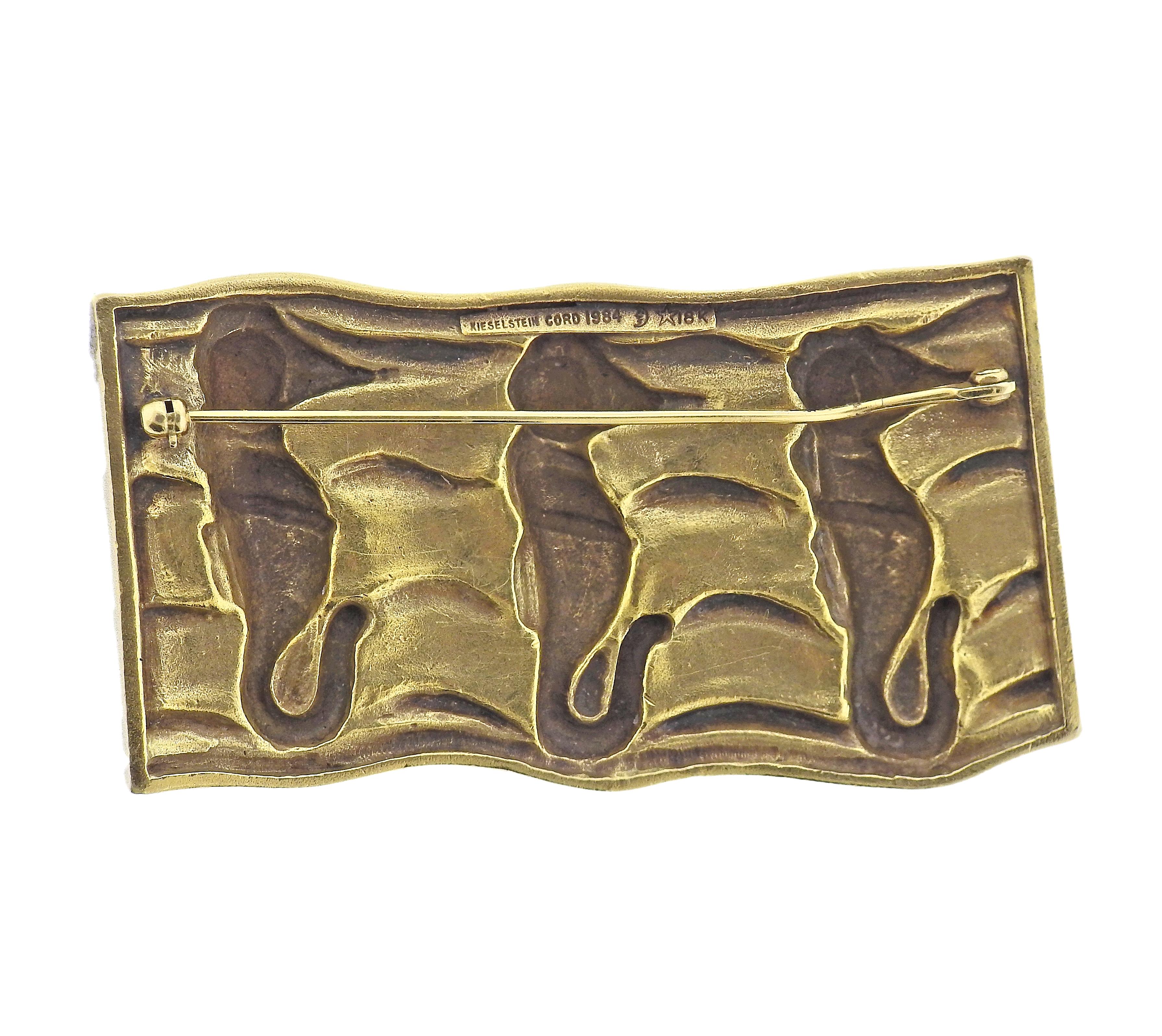 Circa 1984, 18k gold brooch by Barry Kieselstein-Cord, depicting three seahorses. Brooch measures 2.5