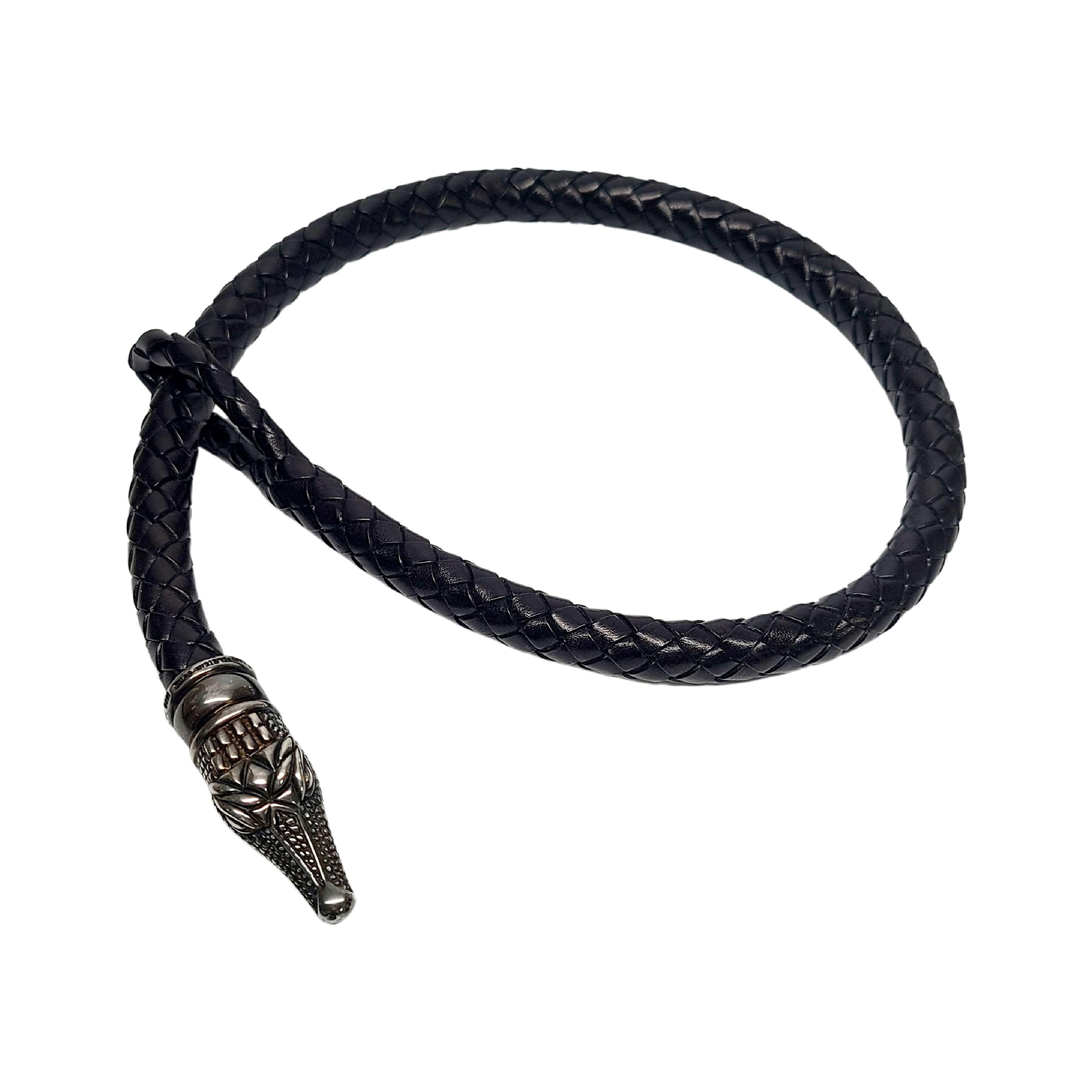 Sterling silver alligator head on a braided leather choker necklace by KIESELSTEIN-CORD with original pouch.

Beautifully detailed alligator head on a round braided/woven leather cord with a loop at the end. By high-end Manhattan designer