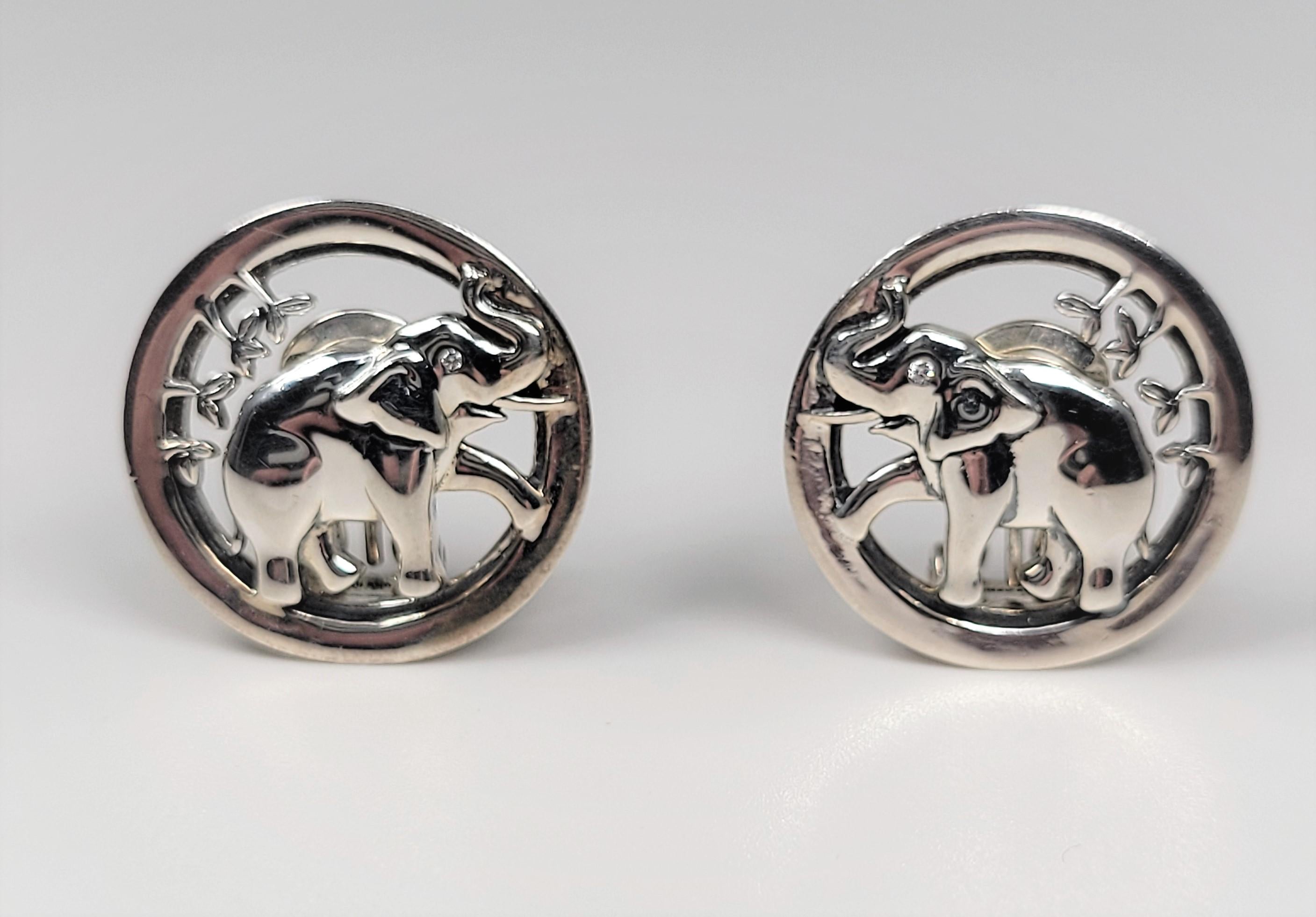 Kieselstein-Cord Sterling Silver elephant earrings with diamond eyes.  These versatile earrings can be worn with pierced ears or as clip ons!