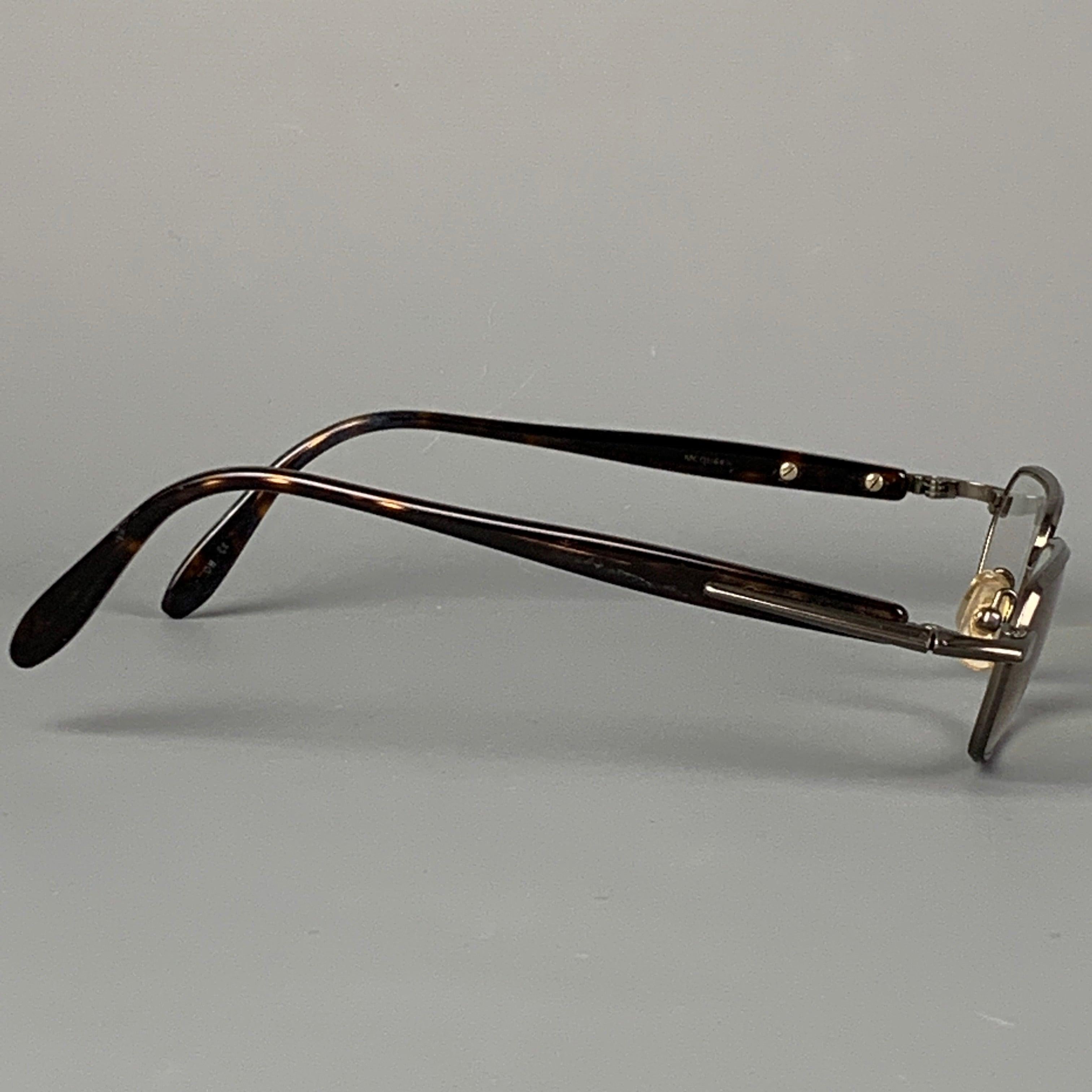 KIESELSTEIN-CORD eyewear comes in a tortoise shell gunmetal with prescription lenses. Made in Japan. Good
Pre-Owned Condition. 

Measurements: 
  Length: 14 cm. Height: 3 inches 
  
  
 
Reference: 114878
Category: Sunglasses & Eyewear
More Details
