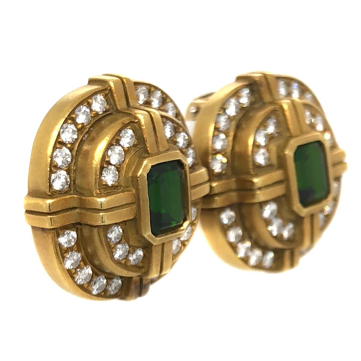 Metal: 18k Gold
Style: Ear Clip
Total Diamond Weight: 2.5 Ct
Diamond Color: D-E
Clarity: VS1-VS2
Stone: tourmaline
Cut: emerald