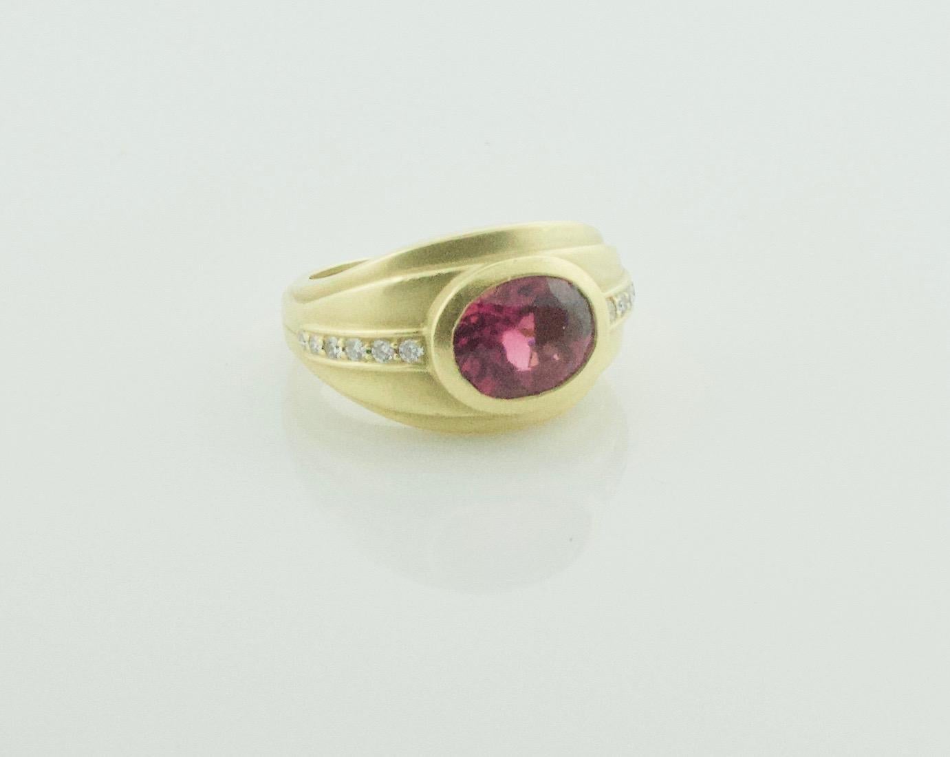 Kieselstein-Cord Tourmaline and Diamond Ring in 18k Yellow Gold
One Oval Tourmaline = 3.00 cts
12Round Brilliant Cut Diamonds Weighing .15 Carats Approximately 
Size 7

