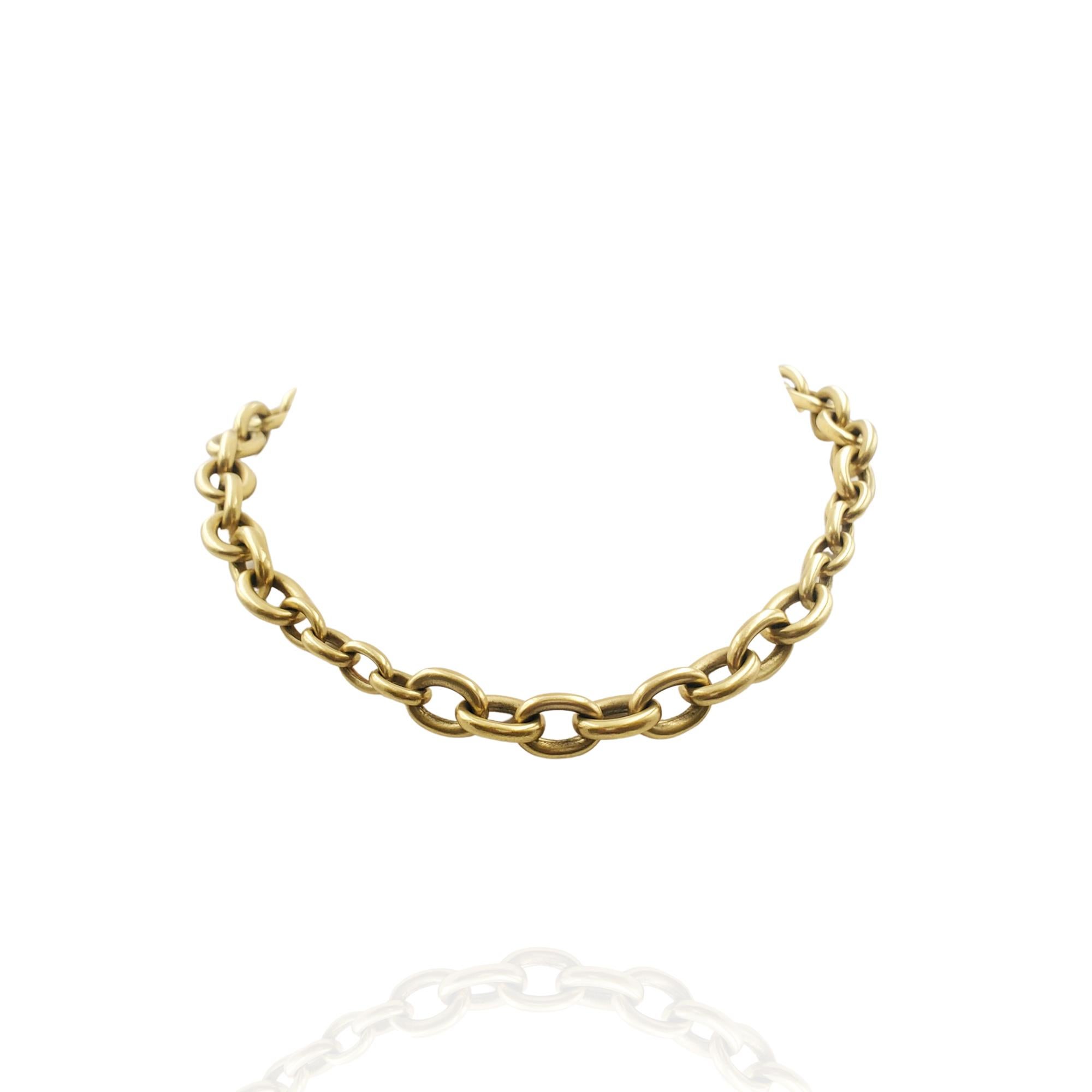 Authentic Barry Kieselstein-Cord necklace crafted in 18 karat yellow gold with a toggle closure. The necklace measures 18 inches in length and features oval links of varying sizes. Signed B. Kieselstein Cord, 1984, USA with hallmarks. Necklace is
