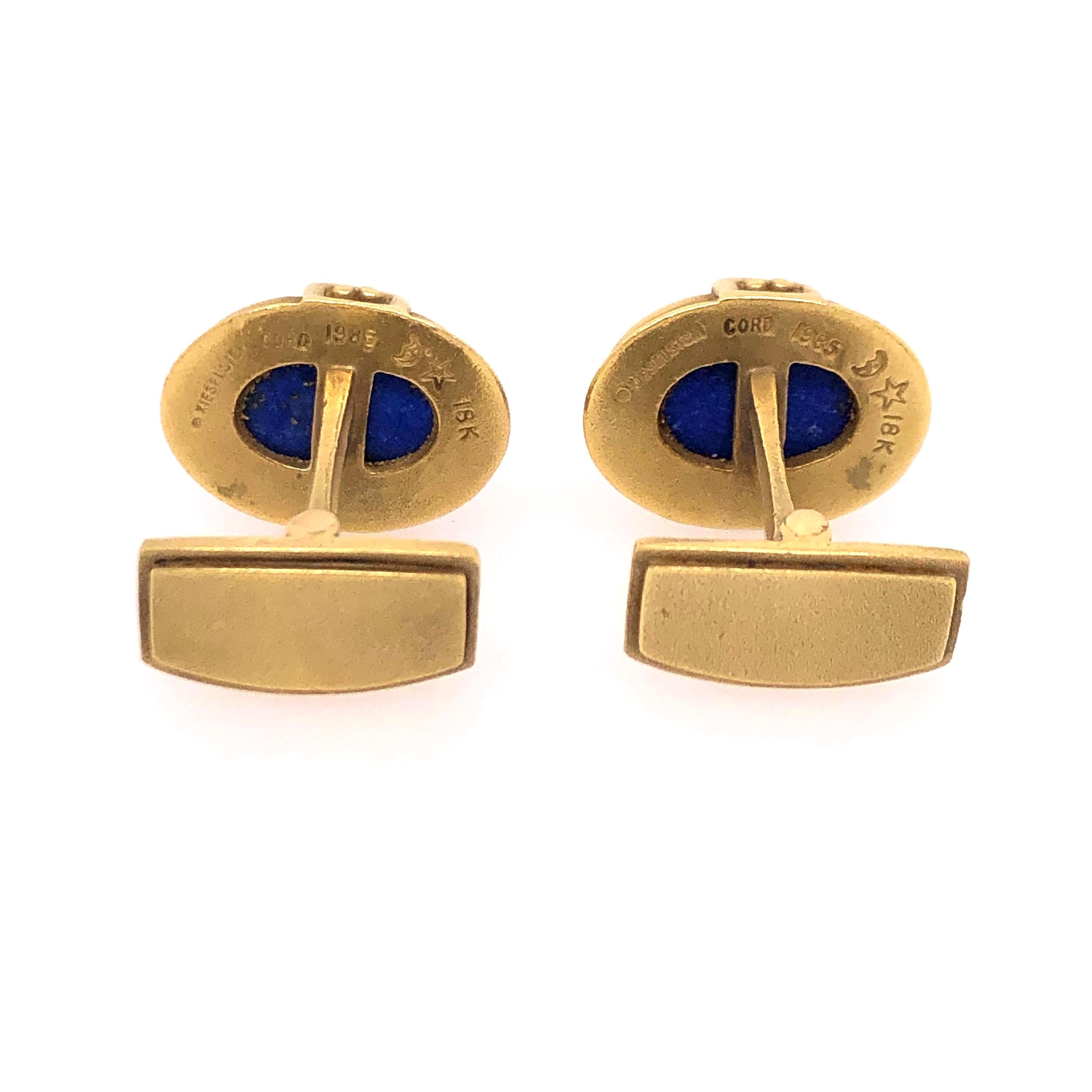 Vintage Yellow Gold Kielstein Oval Lapis Intaglio by Sun and Moon carved lapis and yellow gold cuff links with detail and granulation on the sides.    

Stamped: ©KIESELSTEIN, CORD, 1985, (MOON ANDF STAR IMAGE), 18K