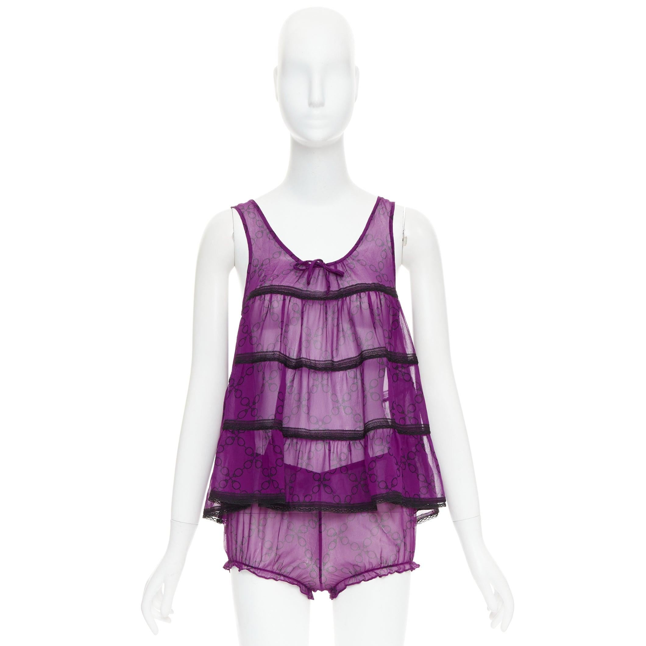 KIKI DE MONTPARNASSE purple 100% silk babydoll bloomer nightwear cami short set XS
Reference: NKLL/A00507
Brand: Kiki de Montparnasse
Material: Silk
Color: Nude, Beige
Pattern: Lace
Closure: Elasticated
Made in: United States

CONDITION:
Condition: