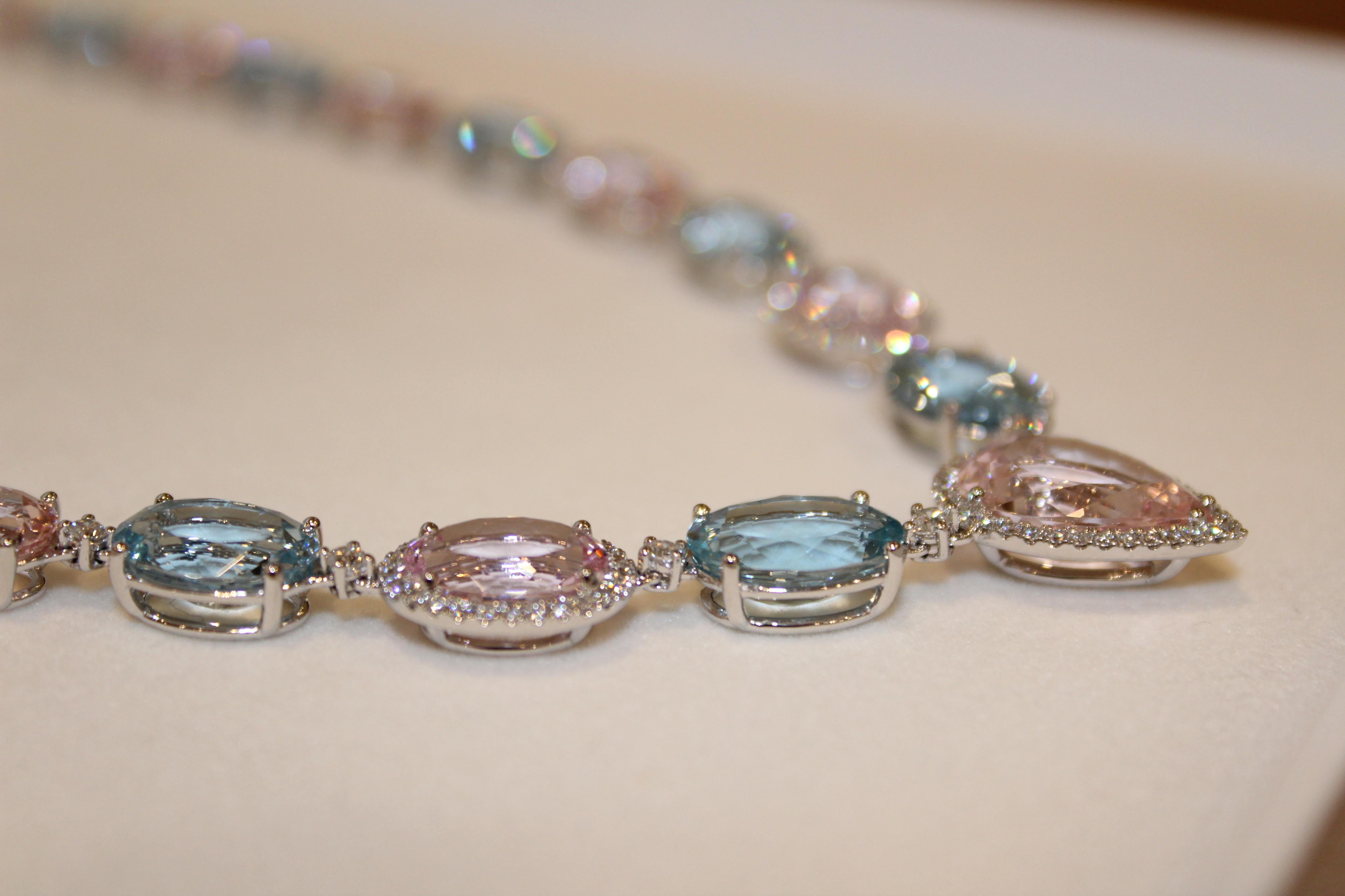 A unique Aquamarine and Morganite (80.09ct) necklace set in 18ct White Gold designed by Kiki McDonough.
This showstopping piece boasts a large central pear cut baby-pink morganite stone accentuated with oval cut aquamarine and morganite around the