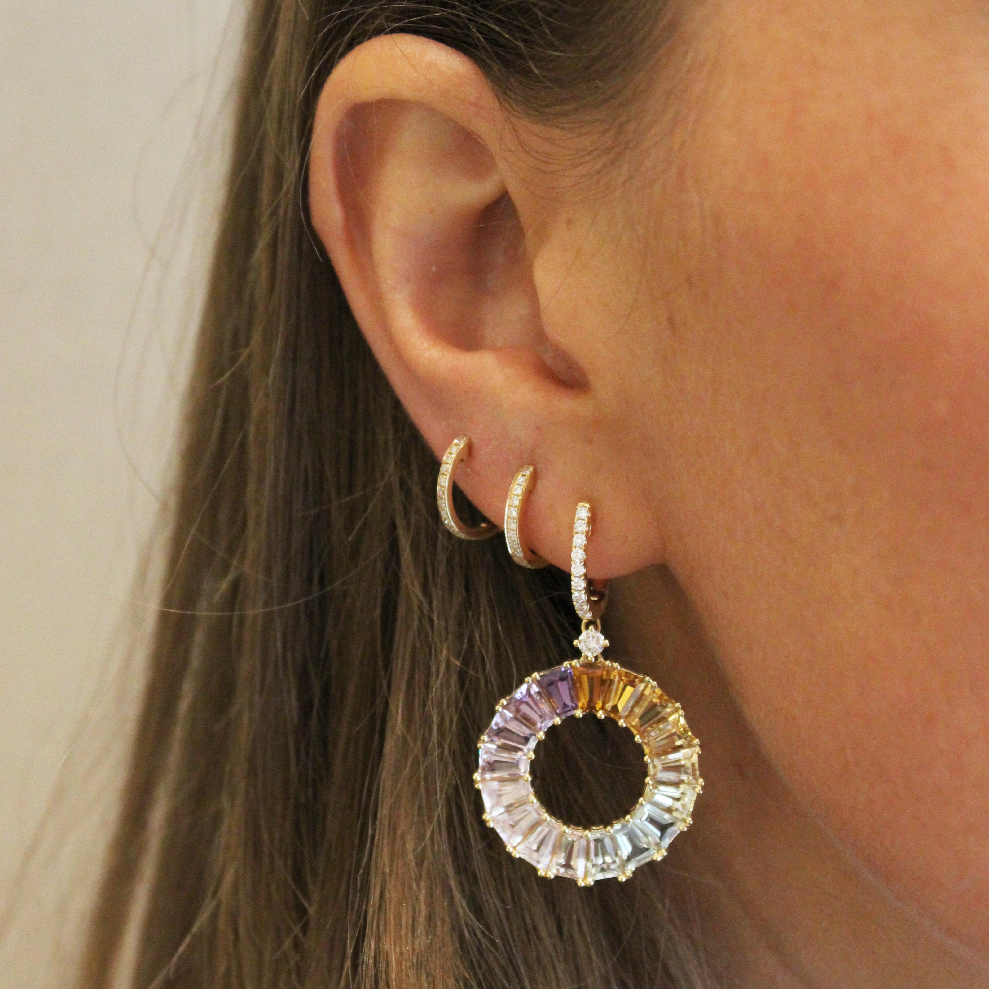 These stunning Rainbow earrings are modern and colourful, making them perfect to wear from day to night. They are set in 18 carat Yellow Gold and feature stones (11.41ct) including Lemon Quartz, Amethyst, Lavender Amethyst, White Topaz and Blue