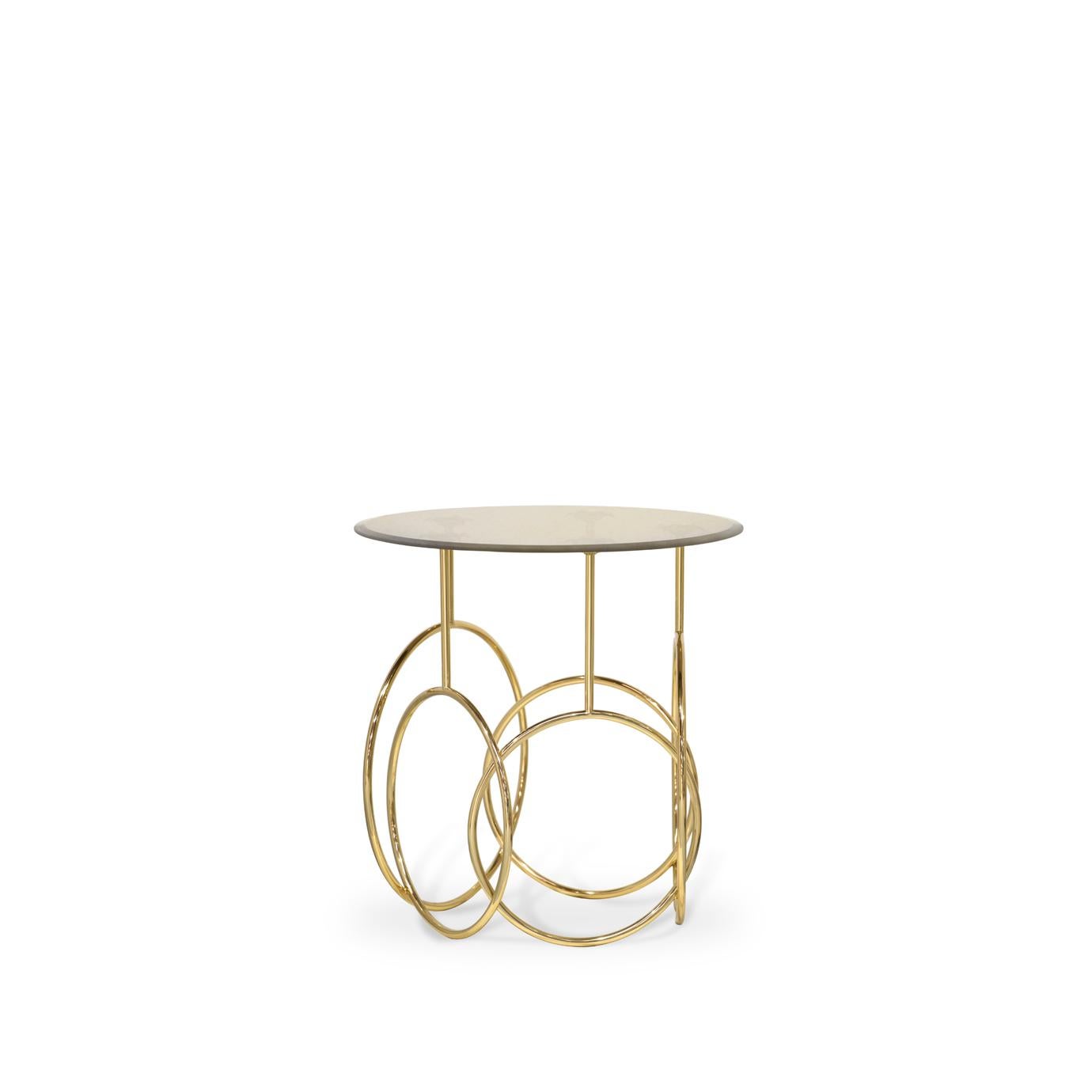The Kiki side table evokes the romantic and seductive beauty of Parisian cabaret life. The revealing frilled undergarments, the surprise high kicks, the mesmerizing hoops accompanied by blinding splendor give this table a sassy new spin on design.