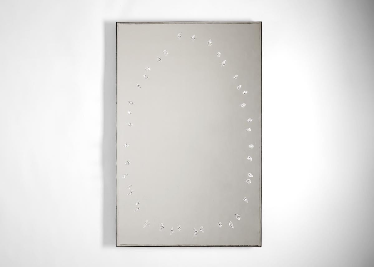 
This mirror is part of a series of pieces that emerge from many simultaneous ideas which have for some time mingled together in the artist’s mind “the way that symbols or characters in a dream have multiple, unrelated meanings.”

On the island of
