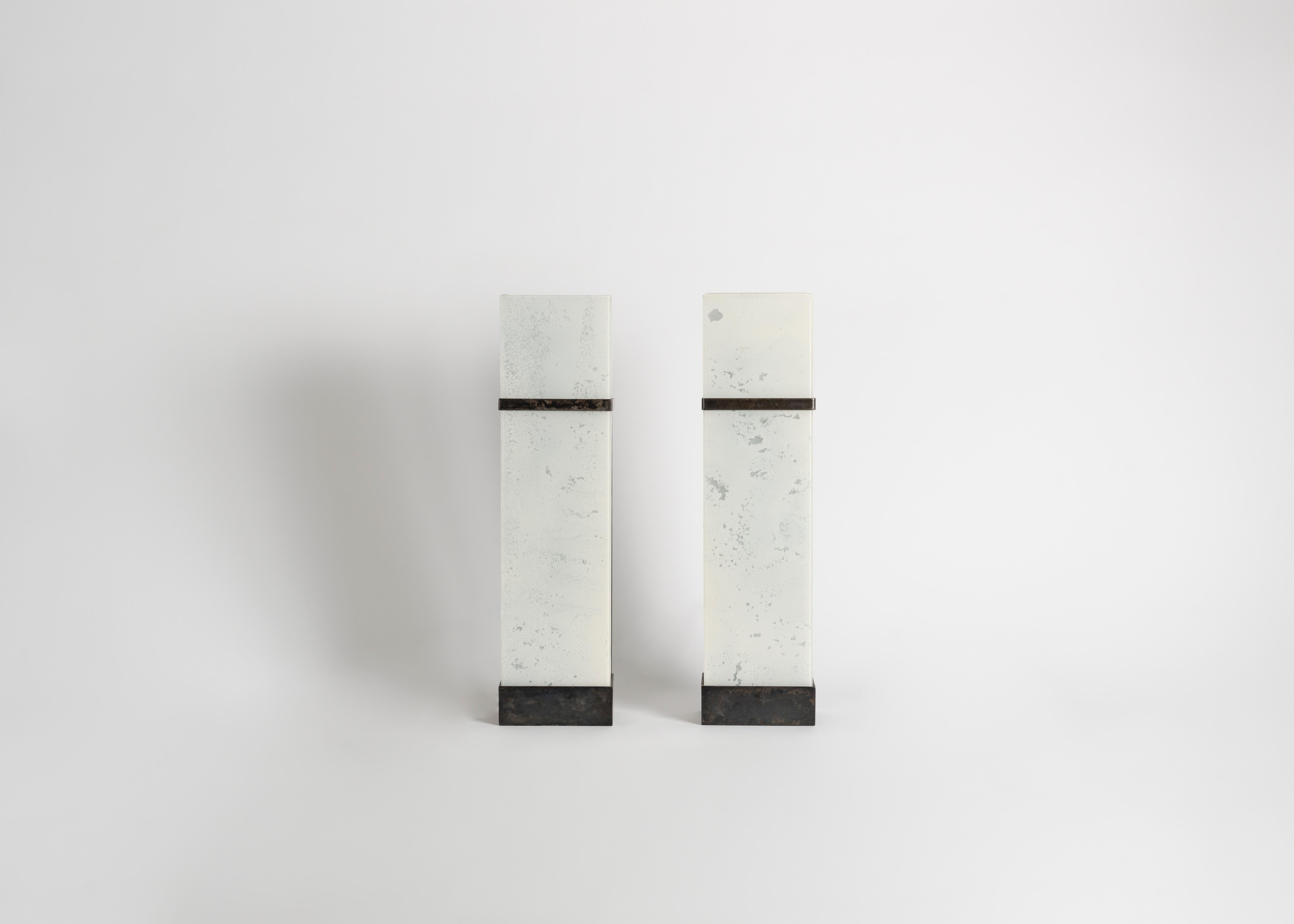 Monogrammed: KL

While best known for his mirrors and églomisé, Kiko Lopez is a master of glass conceptions of all kinds—his lighting designs prove this to be the case. These sleek sconces enshroud their light source in finely formed rectangular