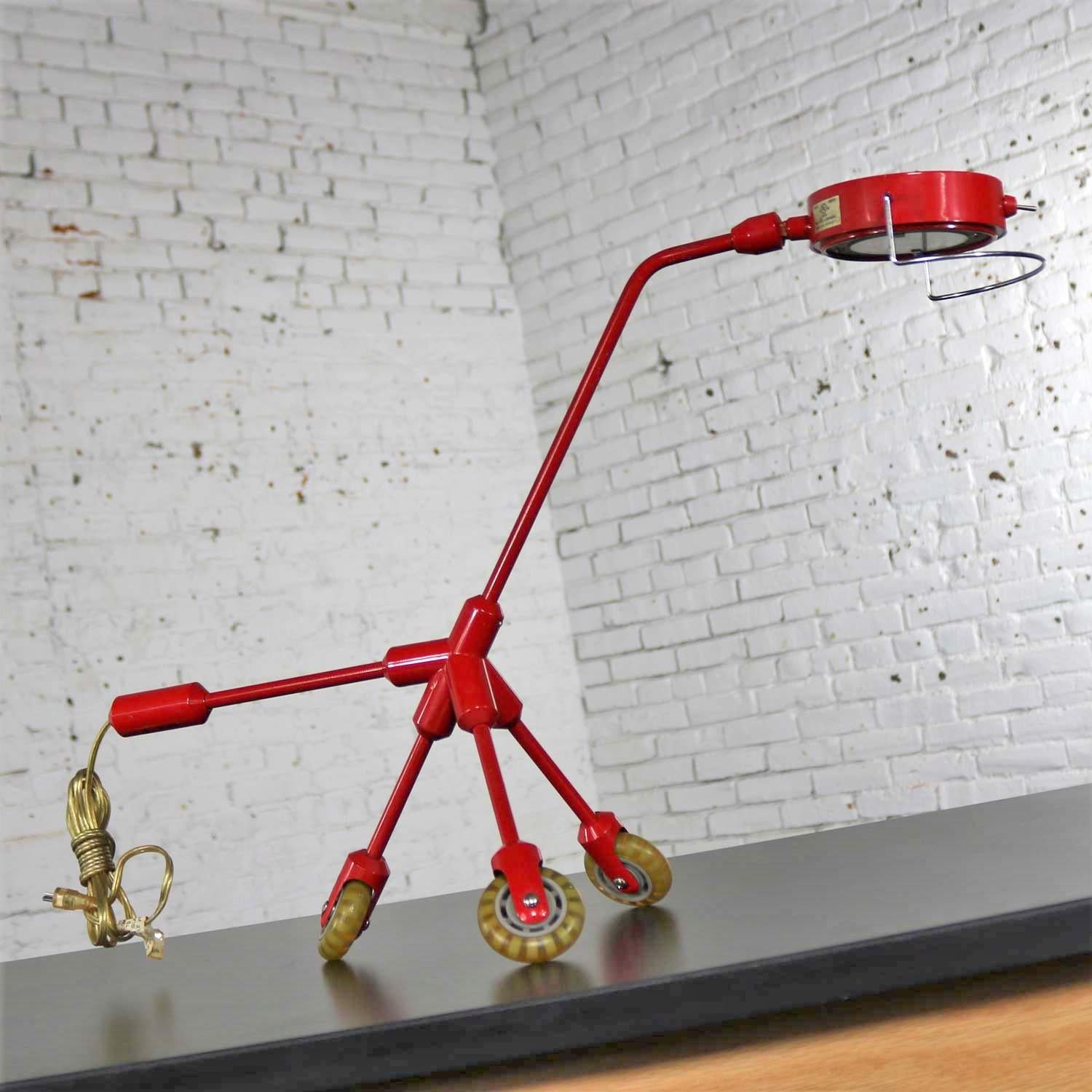 Awesome Kila red dog rolling table lamp designed by Harry Allen for Ikea. It is in wonderful vintage condition. We have provided a new plug adapter. Please see photos, circa 2001.

Ok I never thought I would say IKEA and original awesome design in