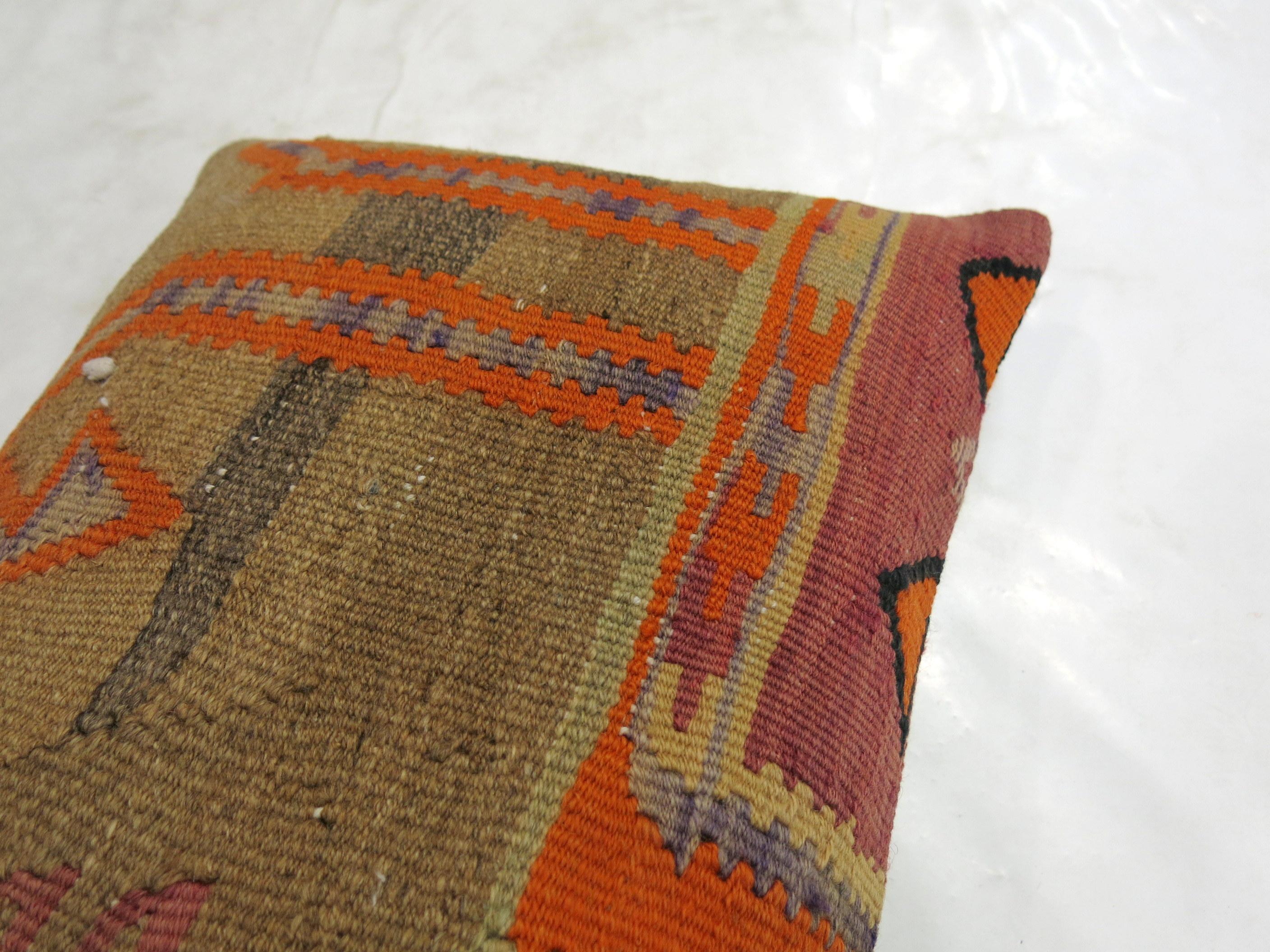 Pillow made from an antique Turkish Kilim flat-weave.