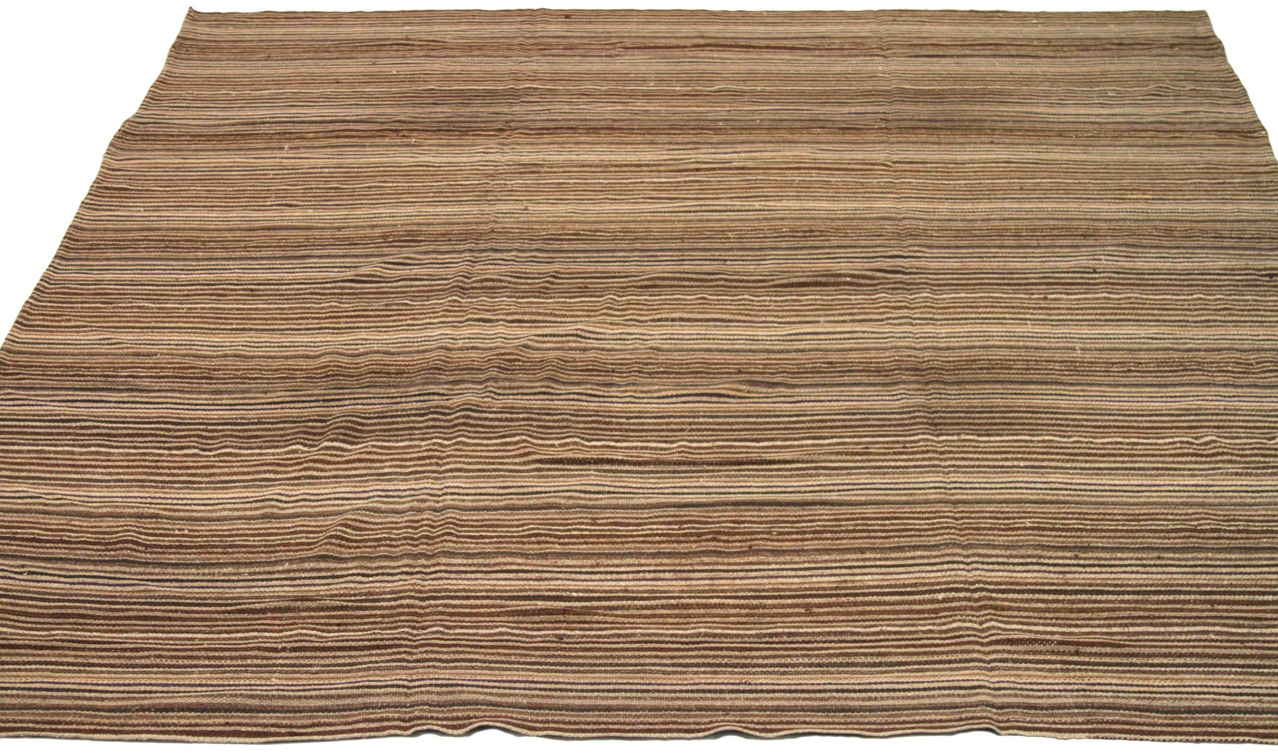 Discover the elegance of this unique Kilim featuring beautiful craftsmanship in Circa 1880. Designed with meticulous attention to detail, this exclusive design is perfect for enhancing your space.
