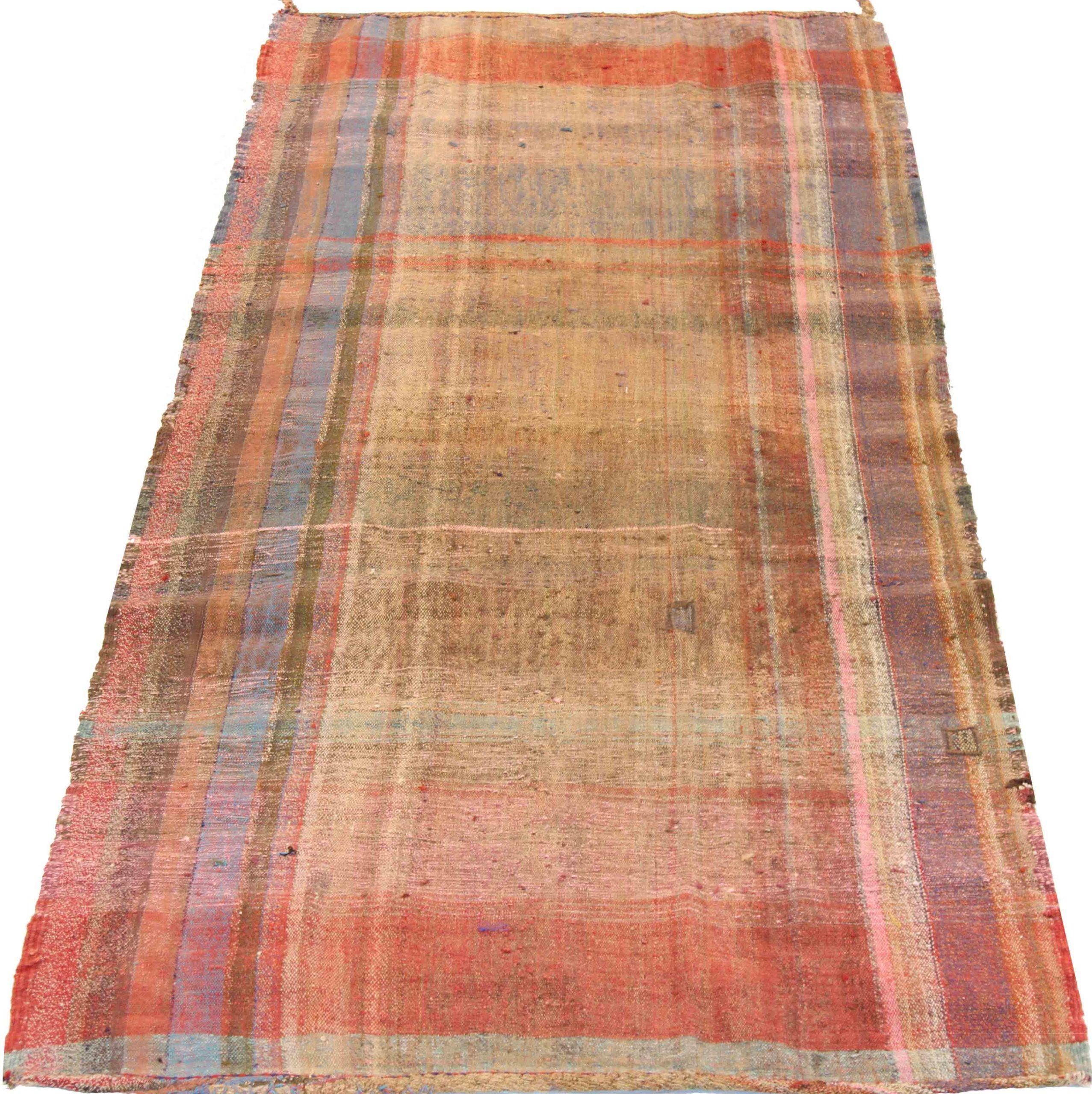 Discover the elegance of this unique Kilim featuring beautiful craftsmanship in Circa 1880. Designed with meticulous attention to detail, this exclusive design is perfect for enhancing your space.
