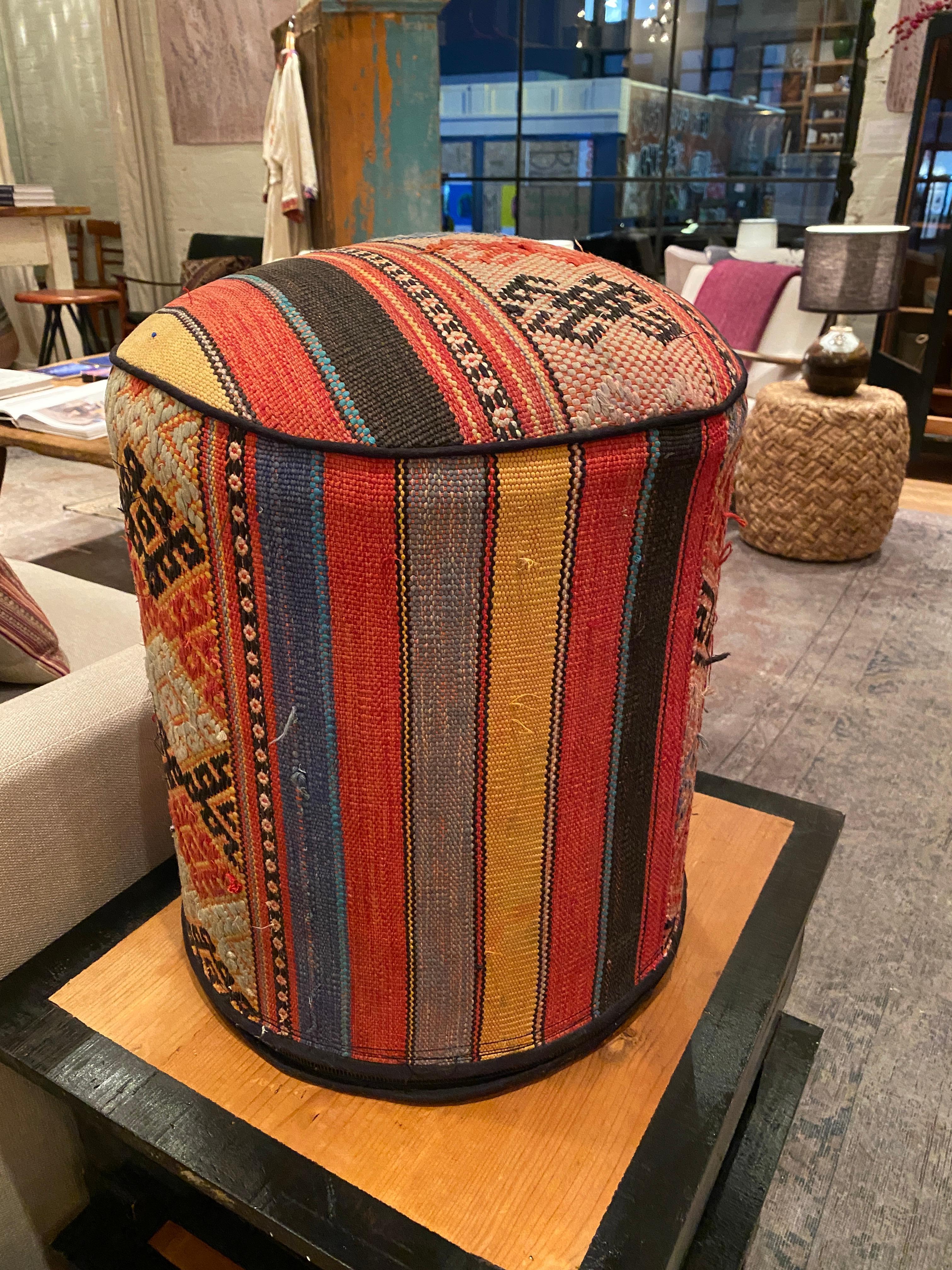 Colorful, playful and beautifully crafted, these stools are made with individual cuts of authentic Kilim fabric. Each will feature slight variations due to a handmade cut of the fabric.