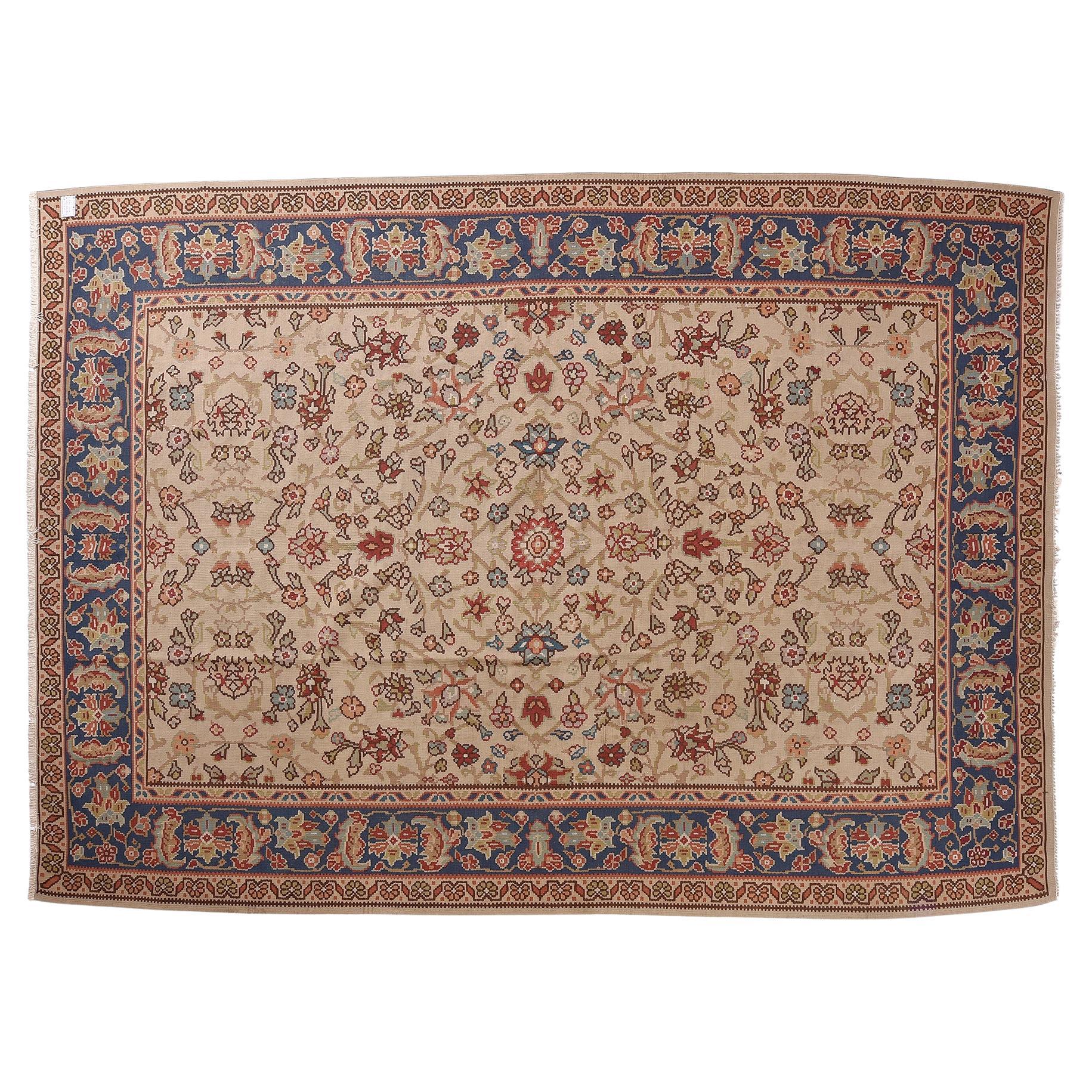 nr. 644 - Elegant Turkish kilim, very particular and large. The background color is pearl grey, with an elegant light floral design; all enclosed in a beautiful blue frame with stylizedleaves and flowers.
Very interesting price  for closing