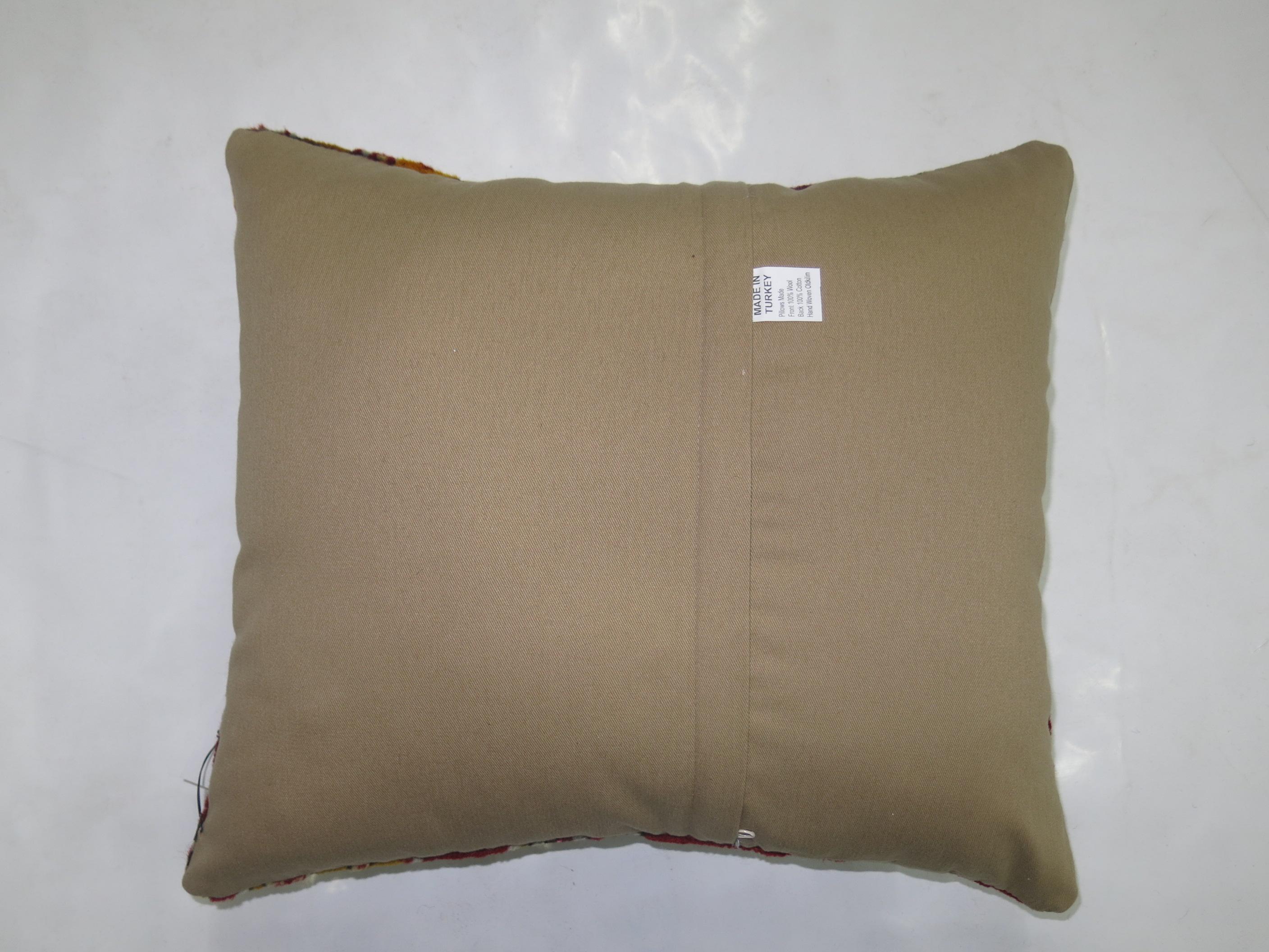 Small pillow made from a vintage Turkish Kilim flat-weave.