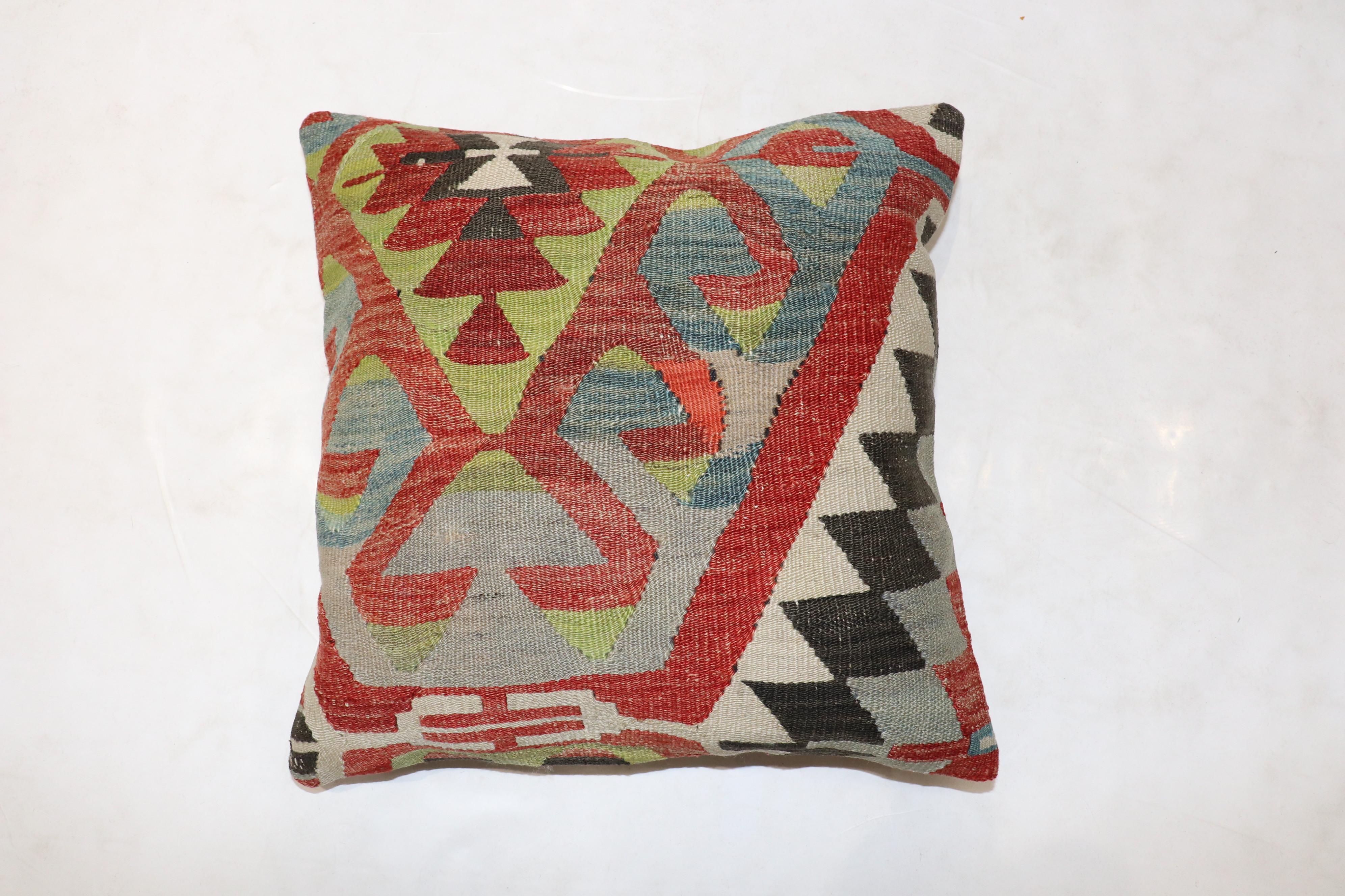 Pillow made from an antique Turkish Kilim flat-weave.

Measures: 19” x 20”.
