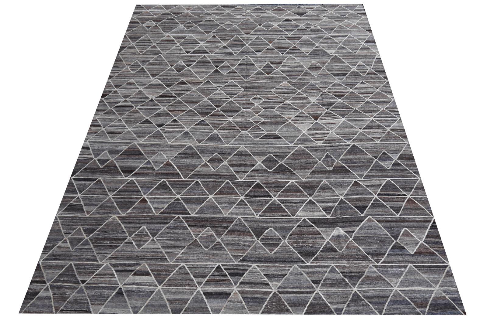 This is a stunning oversized large Kilim rug. Hand-woven flat-weave with geometric design, all wool. It is made of high end quality wool - hand spun, hand dyed with all vegetable dyes, flat woven by master weavers. This Kilim rug is very decorative