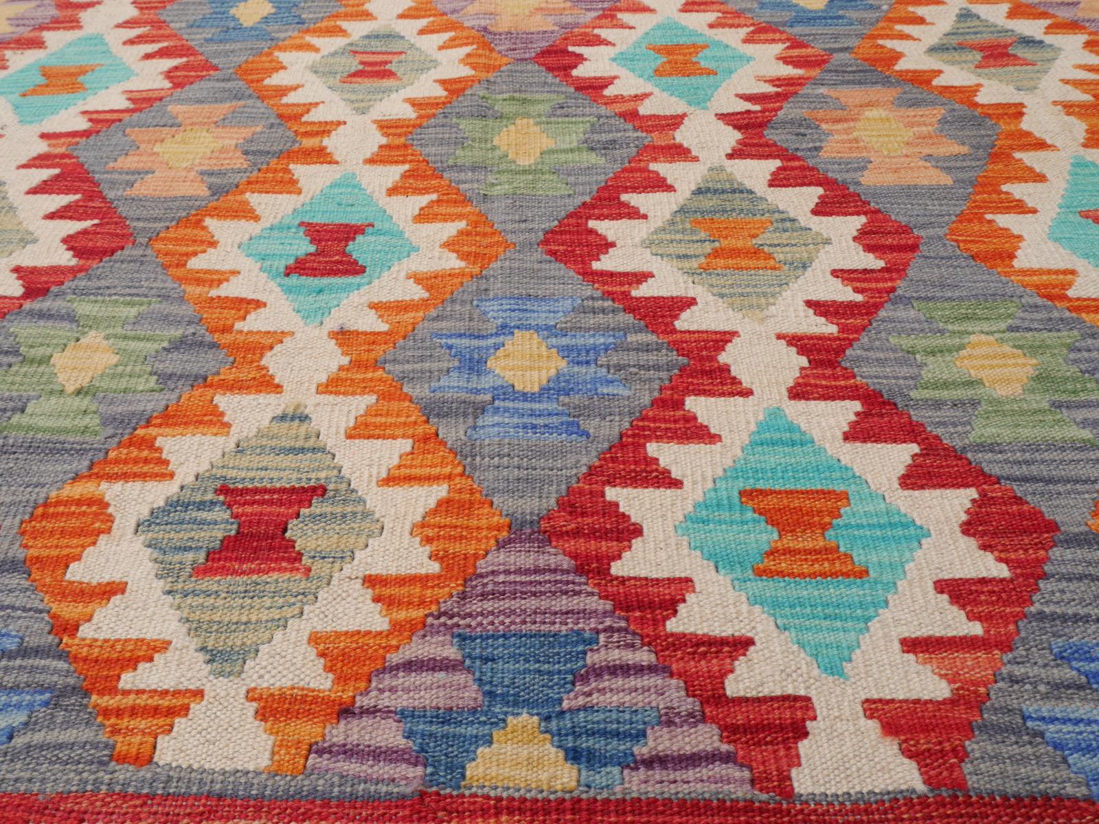 Arijana Kilim Rug hand-woven carpet
Arijana Kilim rugs are made by tribes in southern Afghanistan close to the Pakistan border.
Arijana carpets are of high quality. This Kilim Rug was hand woven with natural pigment dyed wool, the Diamond Design