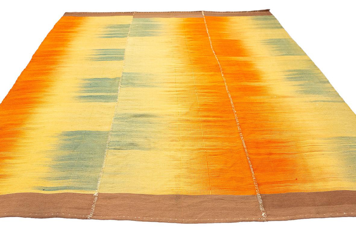 Kilim Rug Sunset Gradient Design
Add a splash of warmth and elegance to your space with this vibrant handwoven Kilim rug, measuring 227 × 198 cm. Featuring a stunning sunset-inspired gradient of warm oranges, soft yellows, and refreshing greens,