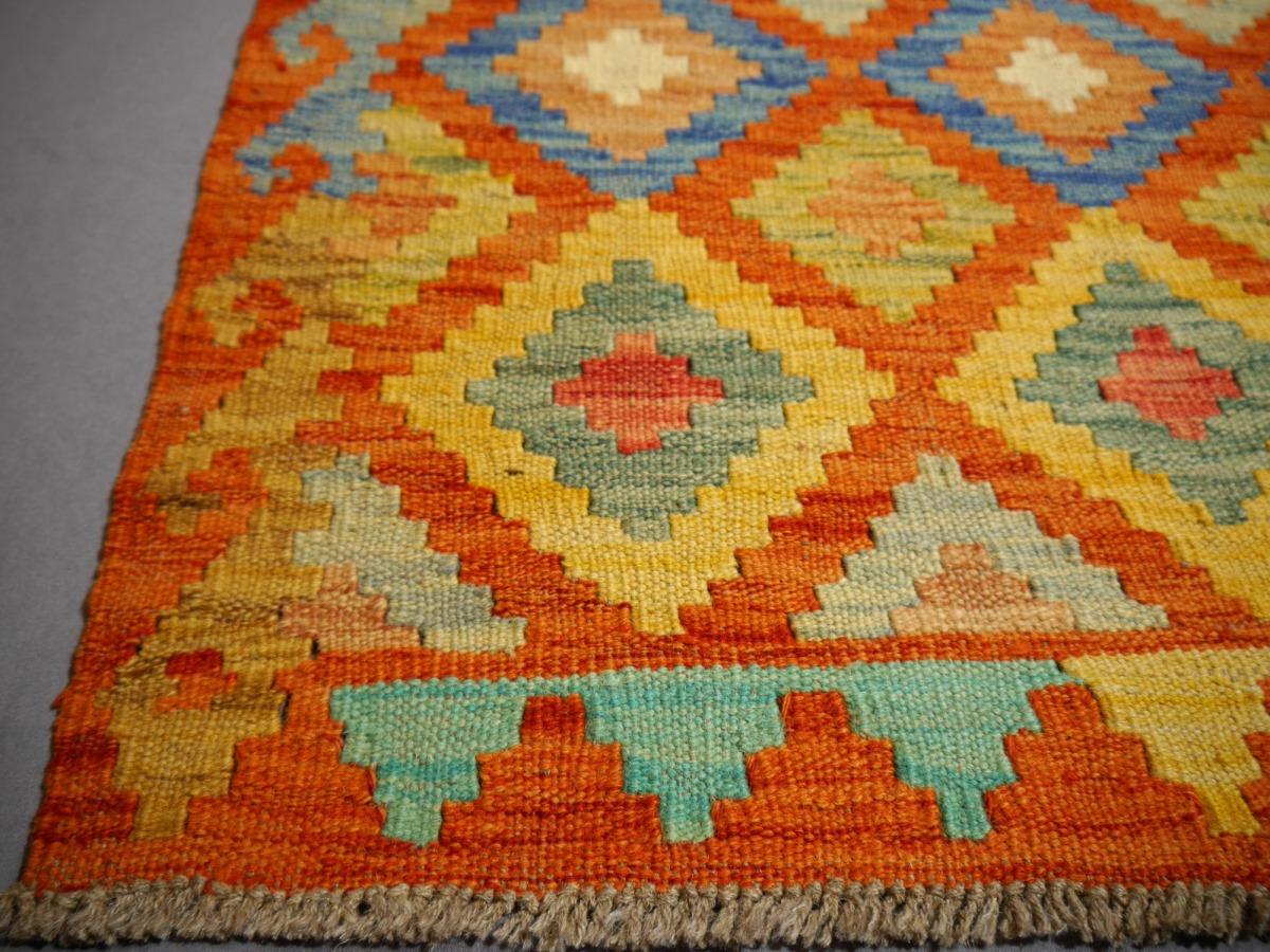 A beautiful tribal Kilim hand-woven carpet
This Kilim rug was hand made by tribal nomads of Asia .
These carpets are of high quality, have color pigments made from natural plants or minerals and are very durable. Thanks to their timeless designs,