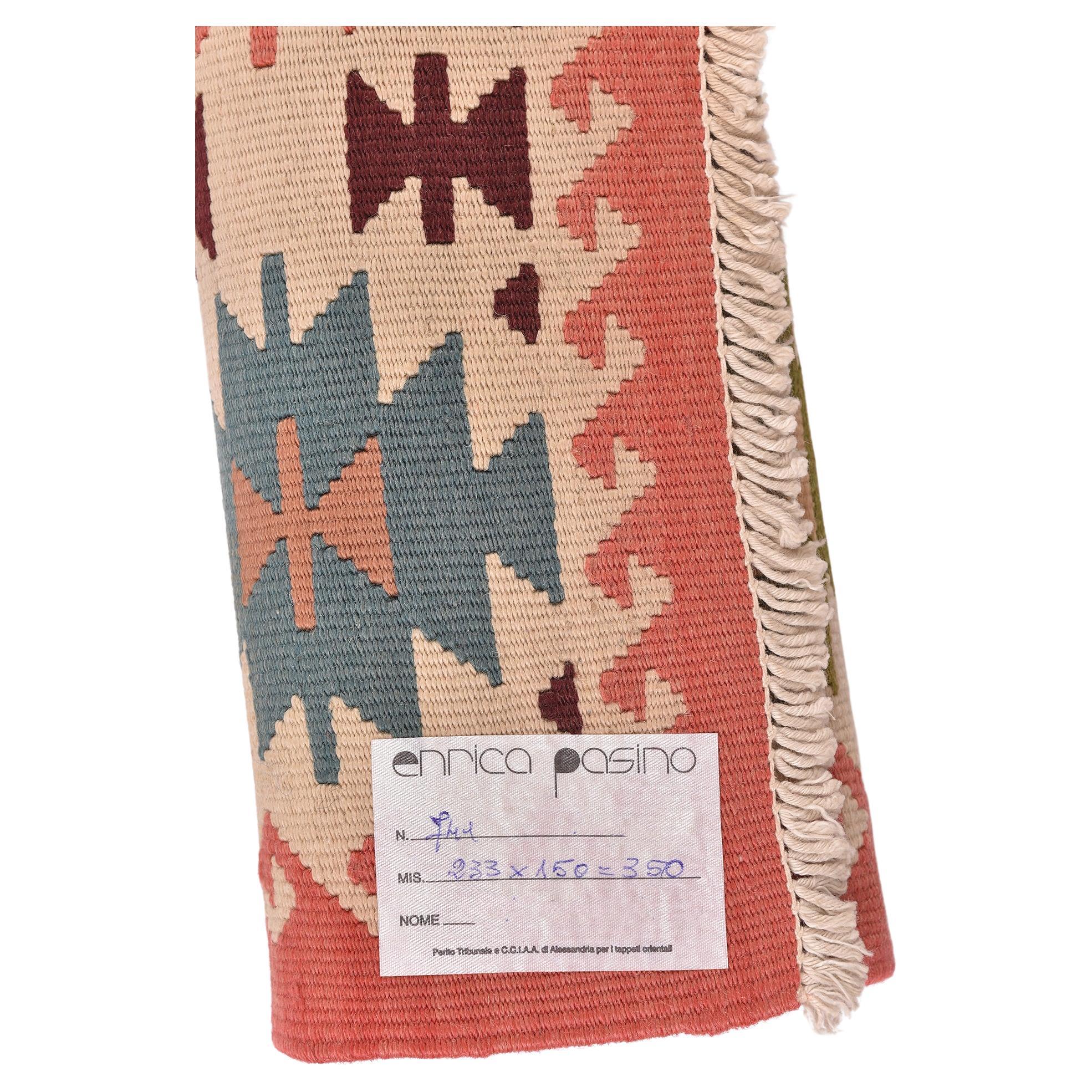 nr. 741 -  A beautiful kilim with pink background and paste colors and a good workmanship, robust and elegant.  No challenging central medallion.
Now with an incredible price because I want to close my activities.
