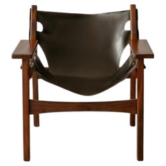 Fauteuil « Kilin » de Sérgio Rodrigues, en bois massif et cuir de selle, Brésil