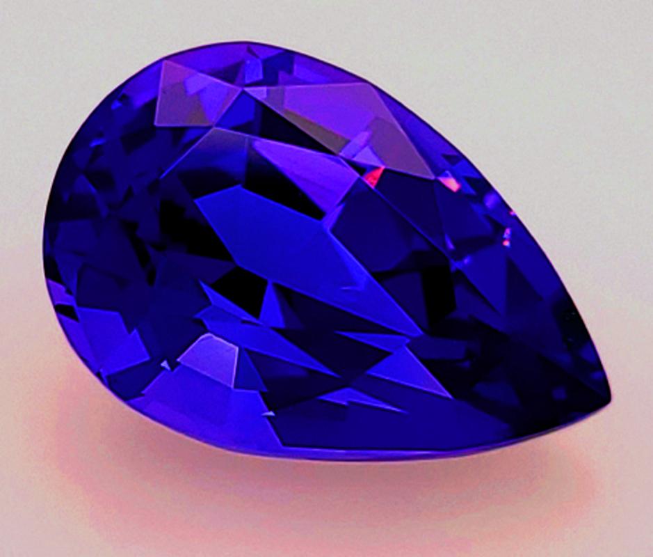 Where are you going to find a better deal for this large, glowing, deep purply blue Tanzanite at a price like this!!???  We have over 43 years in fine colored gemstones in the trade - and our gemstones are frequently published in trade journals,