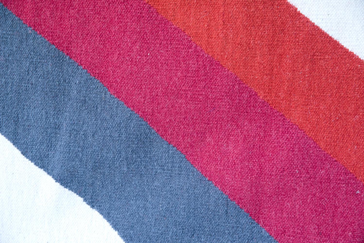 This rug has been ethically handwoven in the finest wool yarns by artisans in north of India, using a traditional weaving technique which is native of this region.
Each rug is handwoven with irregular details to create beautiful imperfections that