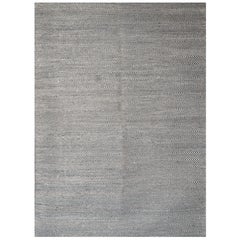 Alfombra moderna tejida a mano en lana Paddle Dhurrie en azul oscuro y blanco espiga lisa