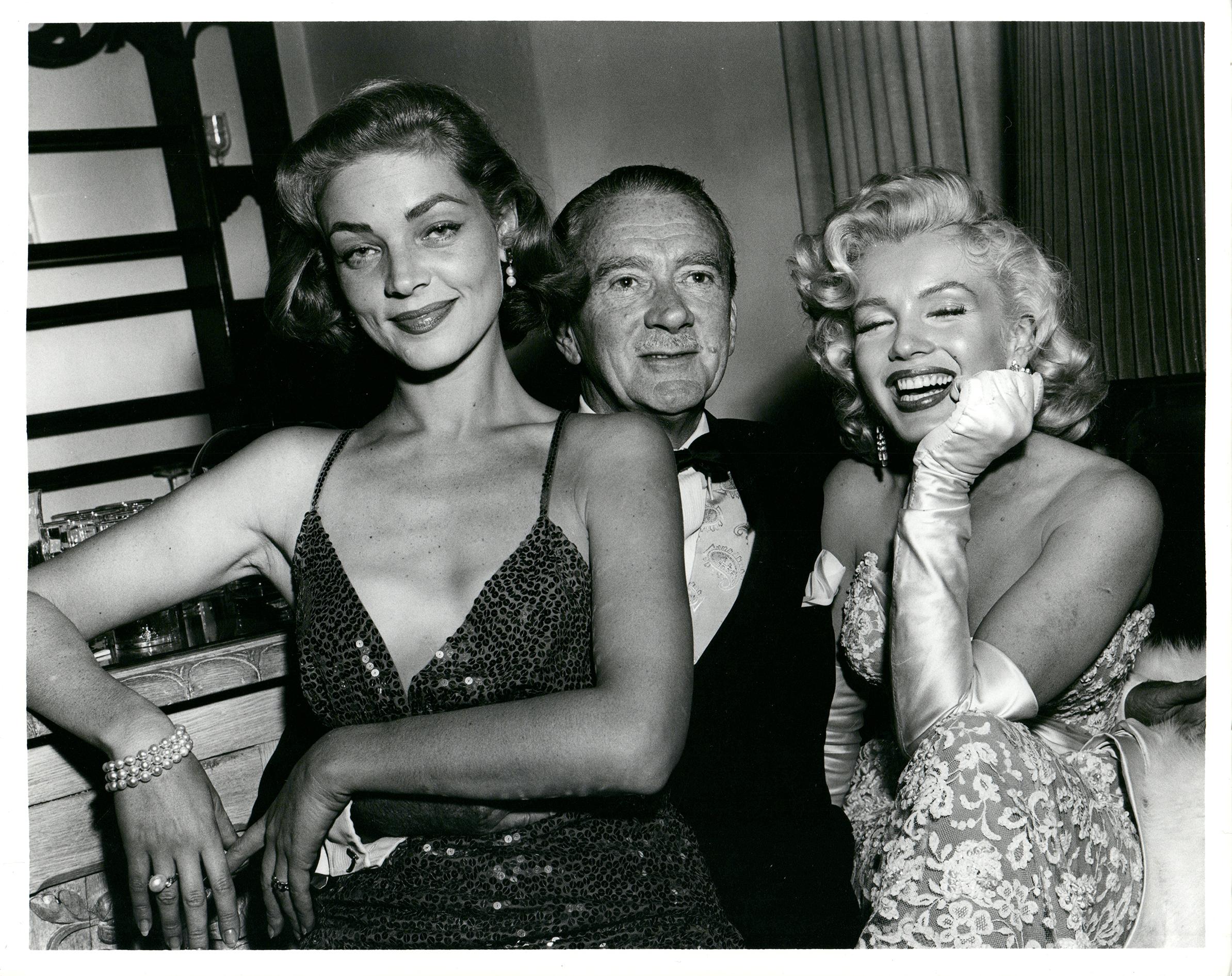 Kim Goodwin Black and White Photograph - Marilyn Monroe and Lauren Bacall Vintage Press Print