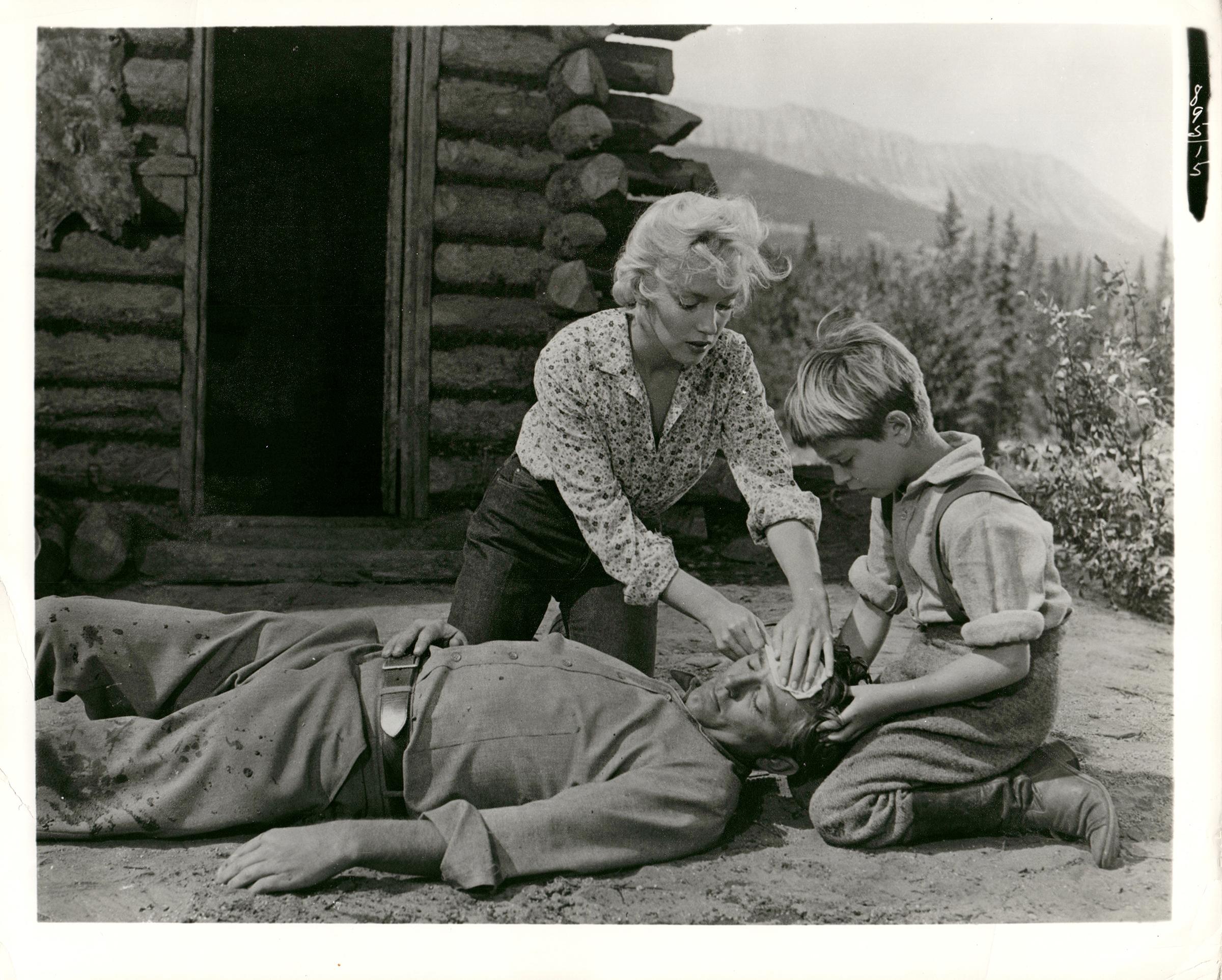 Kim Goodwin Portrait Photograph - Marilyn Monroe with Tommy Retting Vintage Press Print