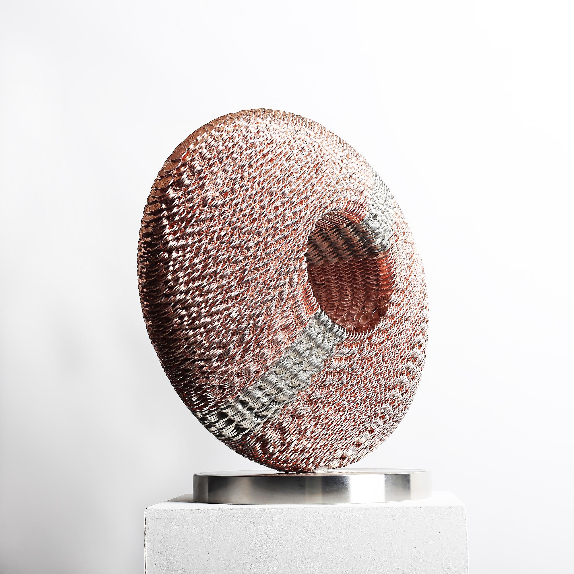 Kinetic sculpture made from coins "Circle XIV" by Kim Seungwoo
