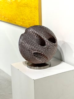 Kinetic sculpture made from coins "Circle XV" by Kim Seungwoo