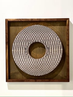 Wall sculpture made from coins "Circle XV" by Kim Seungwoo