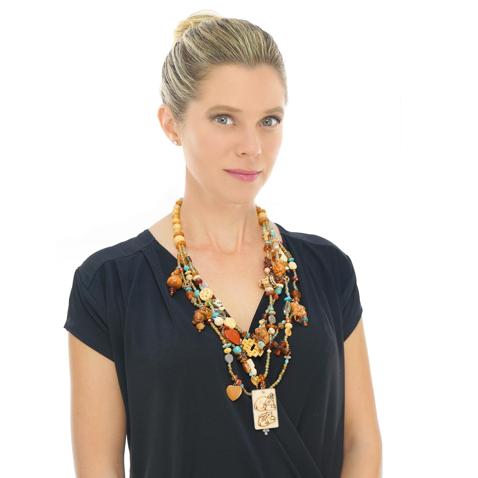 Circa 2000s, Sterling, by Kim Yubeta, Navajo.    This wonderfully charming necklace by Kim Yubeta features a profuse rabbit theme. Each piece of jewelry is handmade by the artist and entirely unique. The look is Southwestern Bohemian. Chic with a