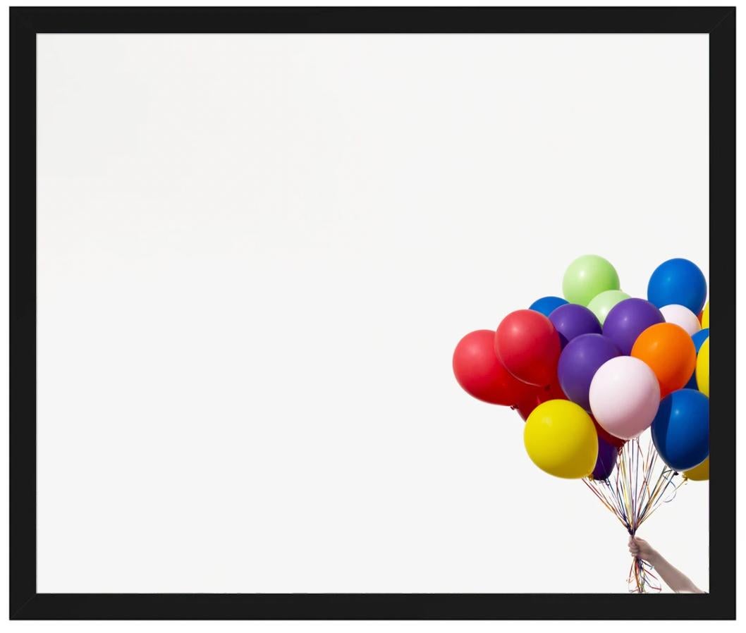 Rainbow Balloons 1 - Gray Still-Life Photograph by Kimberly Genevieve