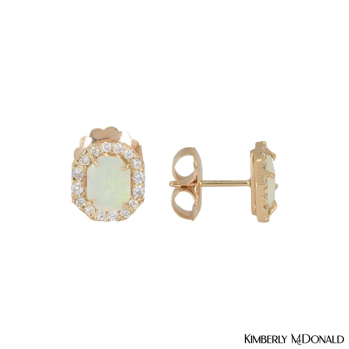 A pair of 18k rose gold opal and diamond earrings by Kimberly McDonald. The earrings are set emerald shaped opal stone in the centre surrounded by pave round brilliant cut diamonds. The 32 diamonds have an approximate weight 0.32ct. The earrings