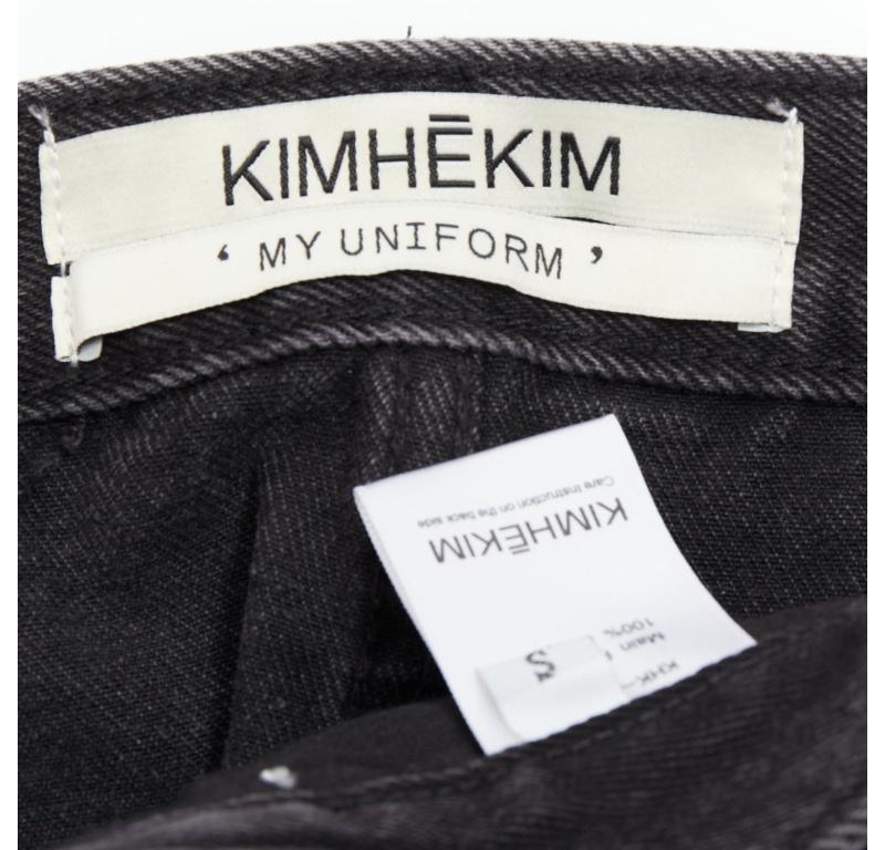 KIMHEKIM My Uniform black washed denim white logo tag frayed skirt S For Sale 3