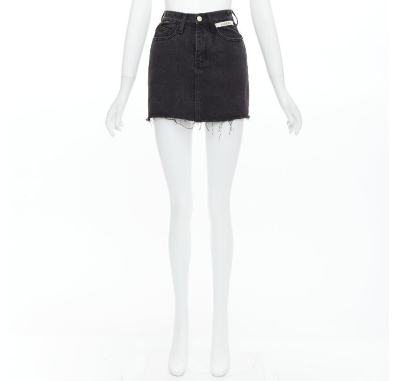 KIMHEKIM My Uniform black washed denim white logo tag frayed skirt S For Sale 4