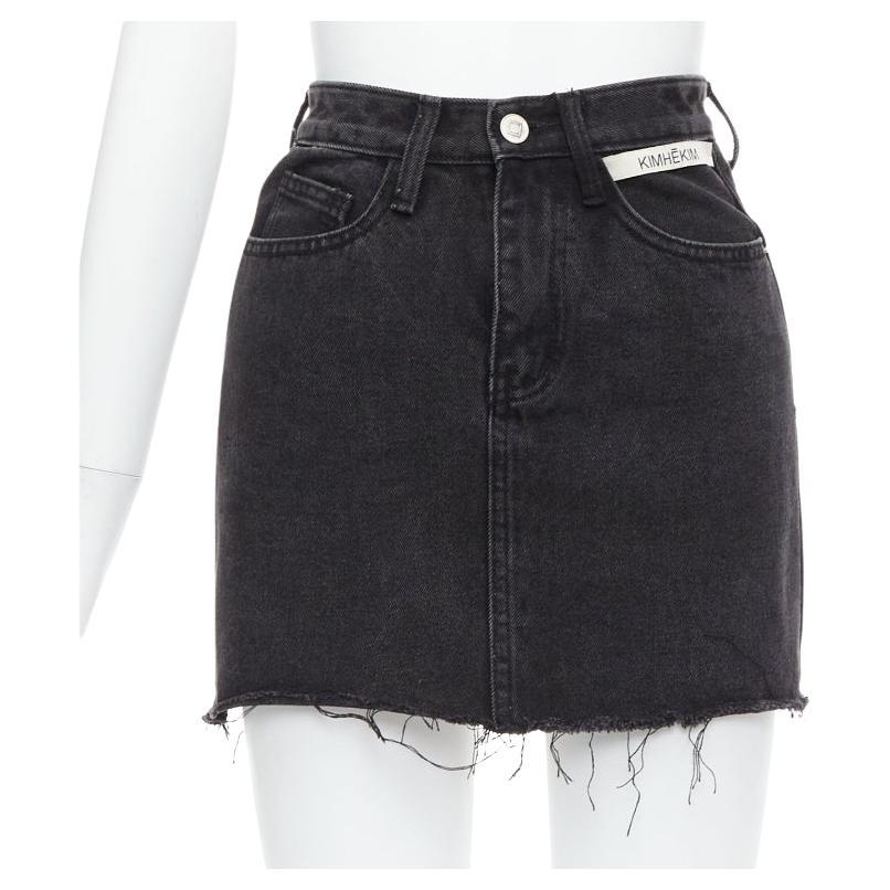 KIMHEKIM My Uniform black washed denim white logo tag frayed skirt S For Sale